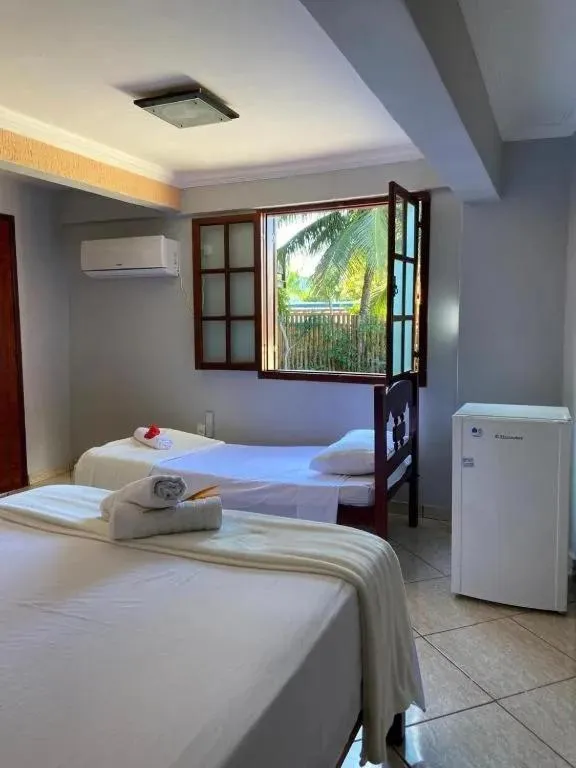 Bed in Pousada Aruna Eco Buzios