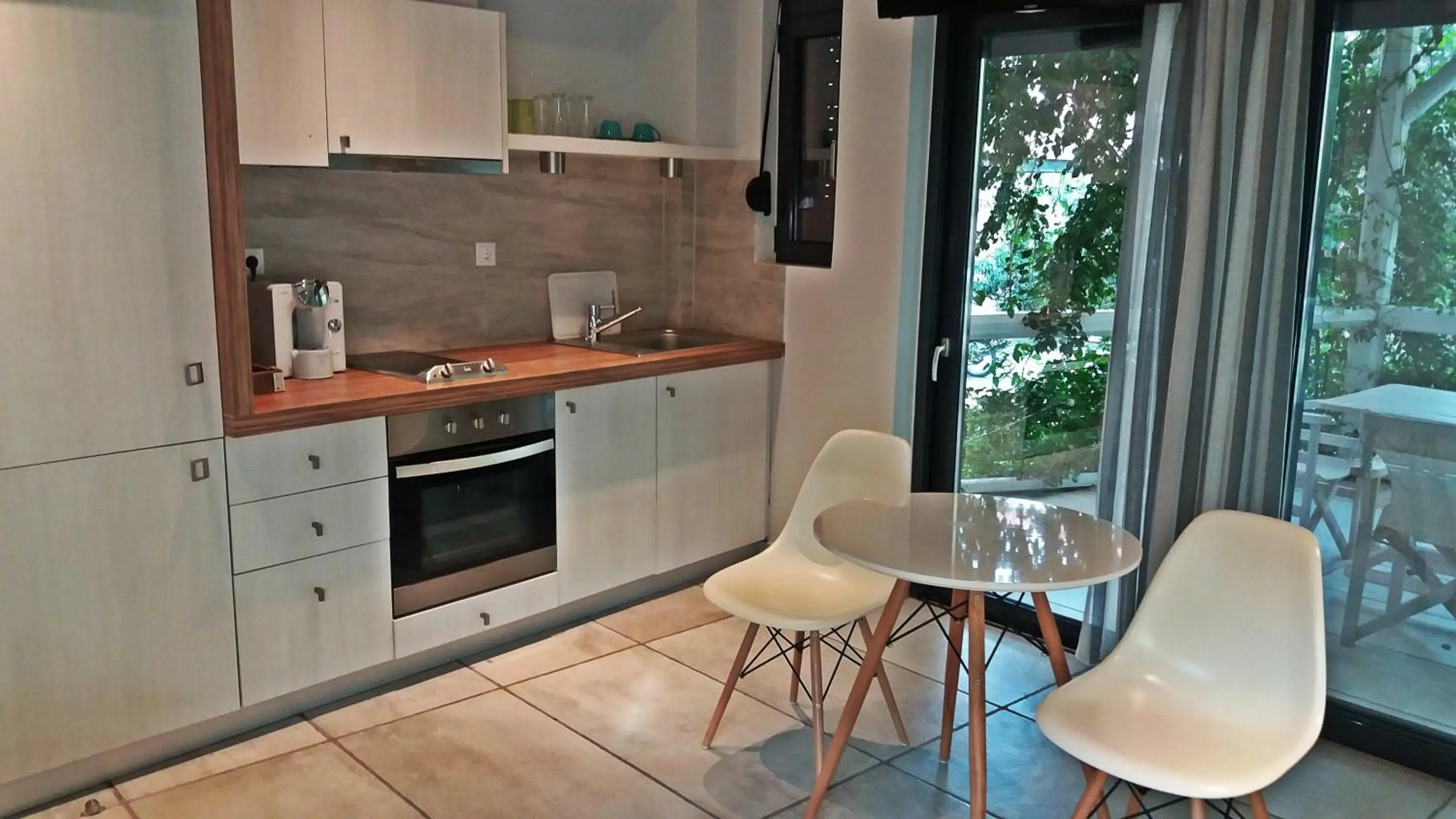 Kitchen or kitchenette in Derveni Luxury Apartments
