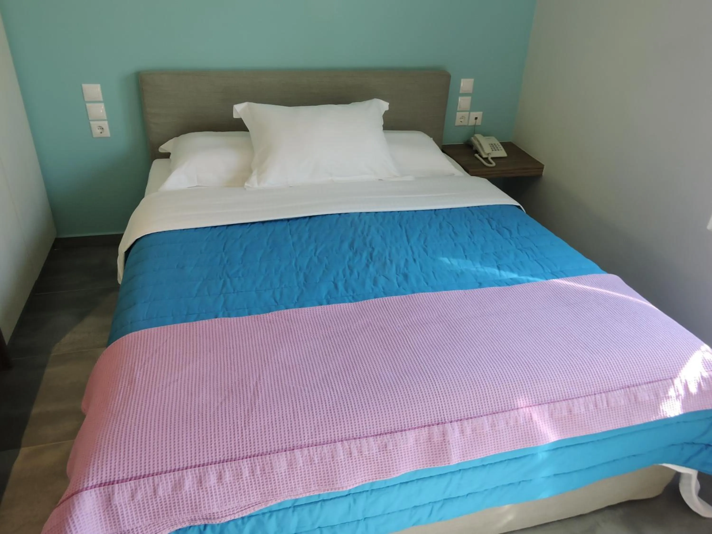 Bed in Derveni Luxury Apartments