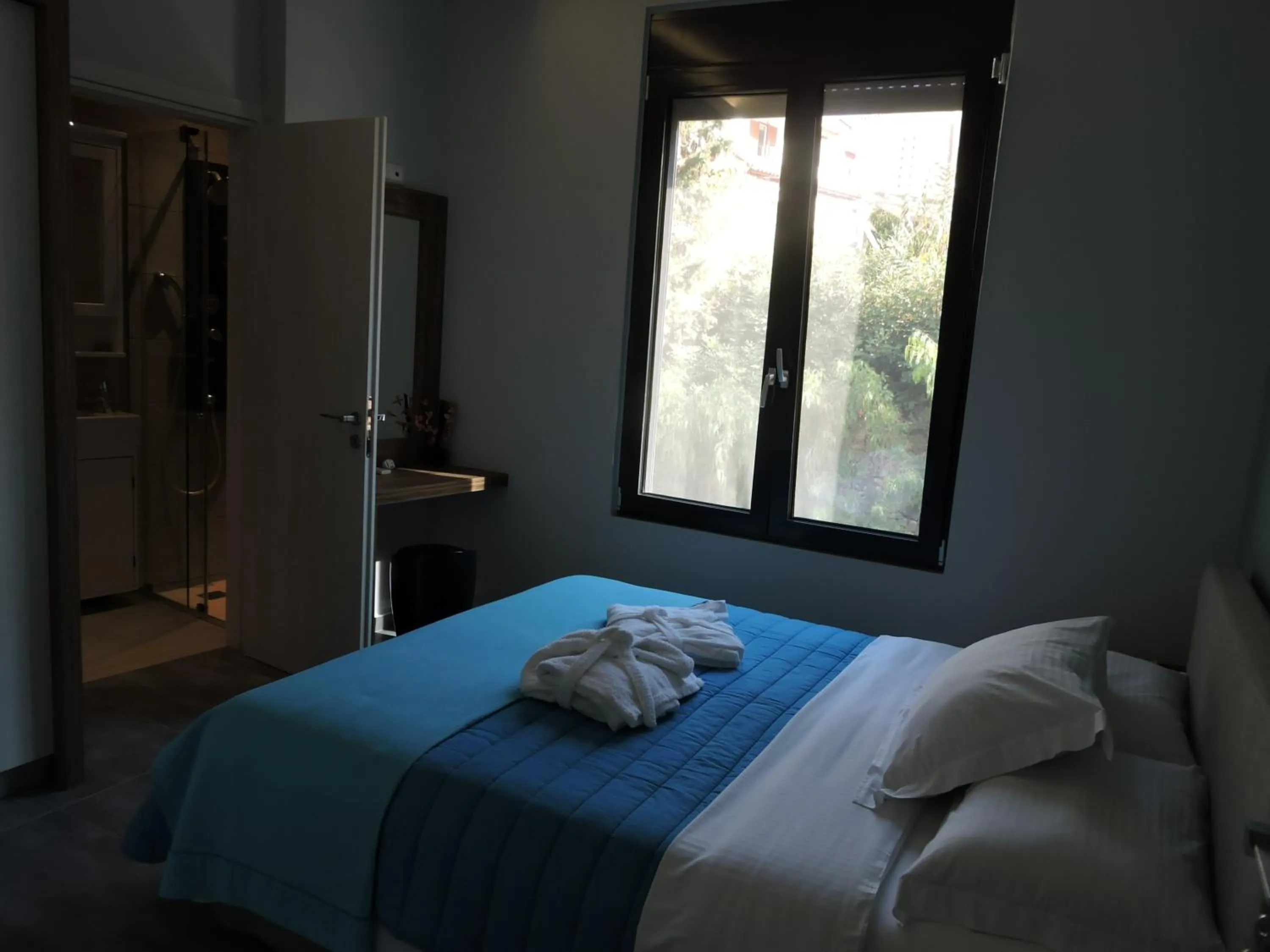 Bed in Derveni Luxury Apartments