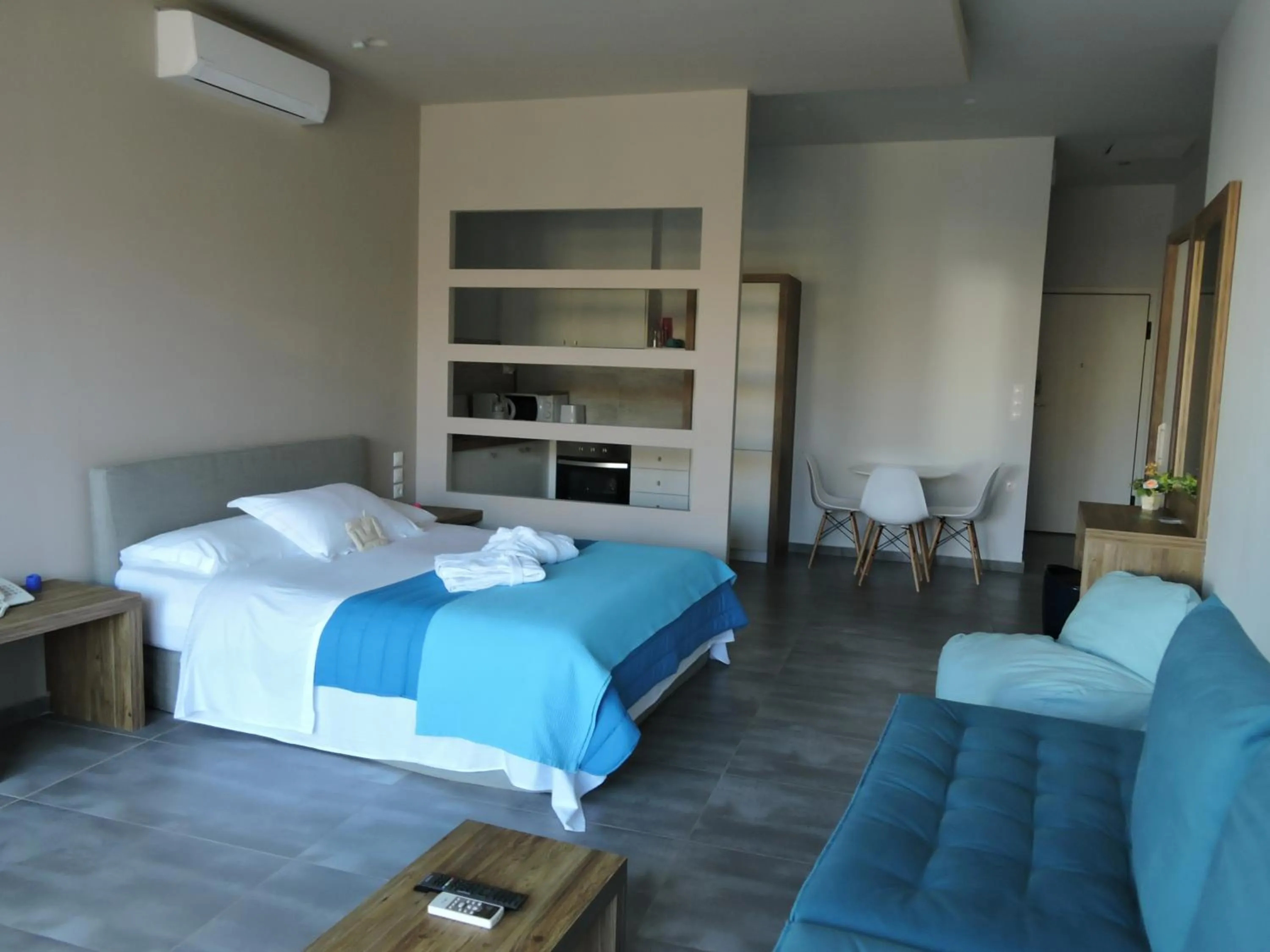Bed in Derveni Luxury Apartments