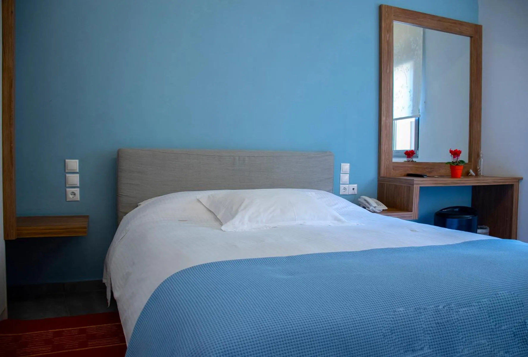 Bed in Derveni Luxury Apartments