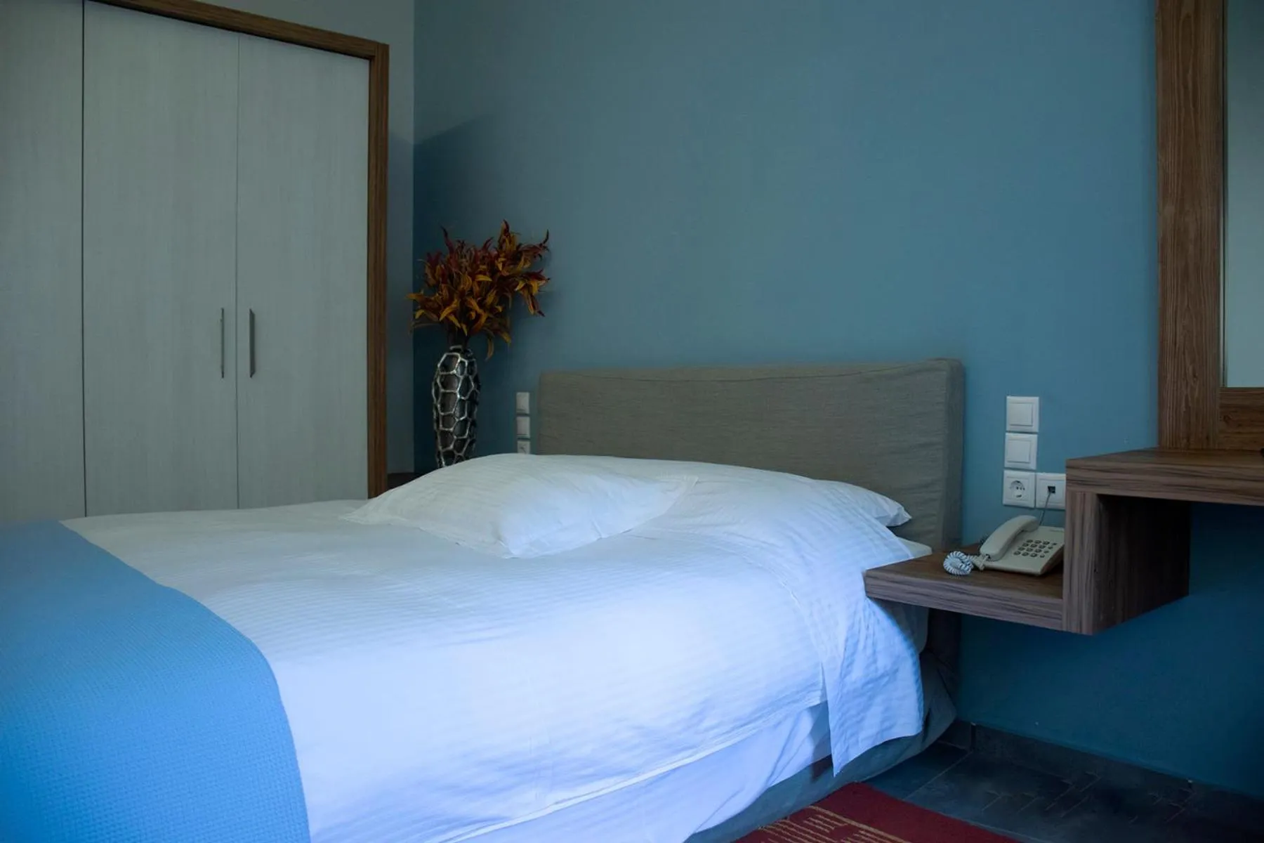 Bed in Derveni Luxury Apartments