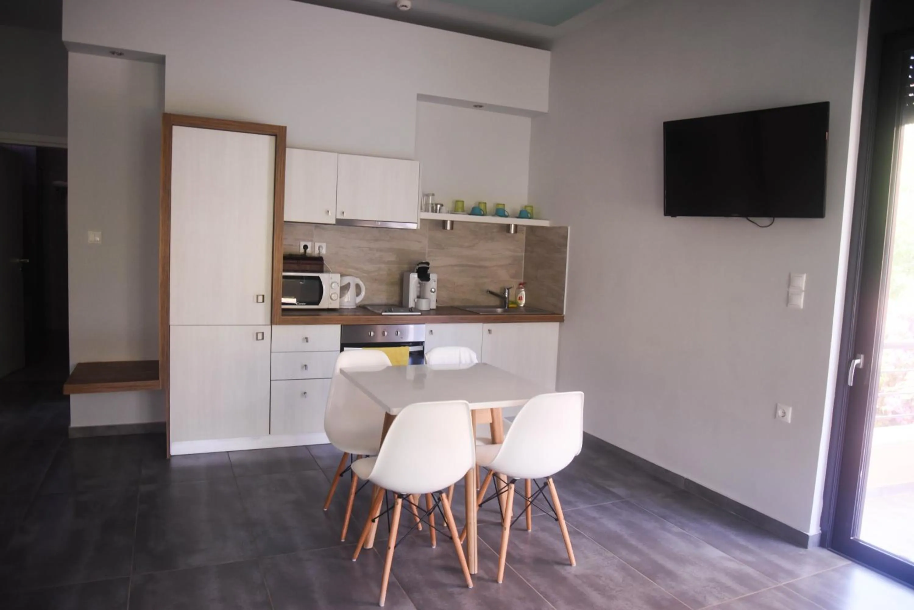 Kitchen or kitchenette in Derveni Luxury Apartments