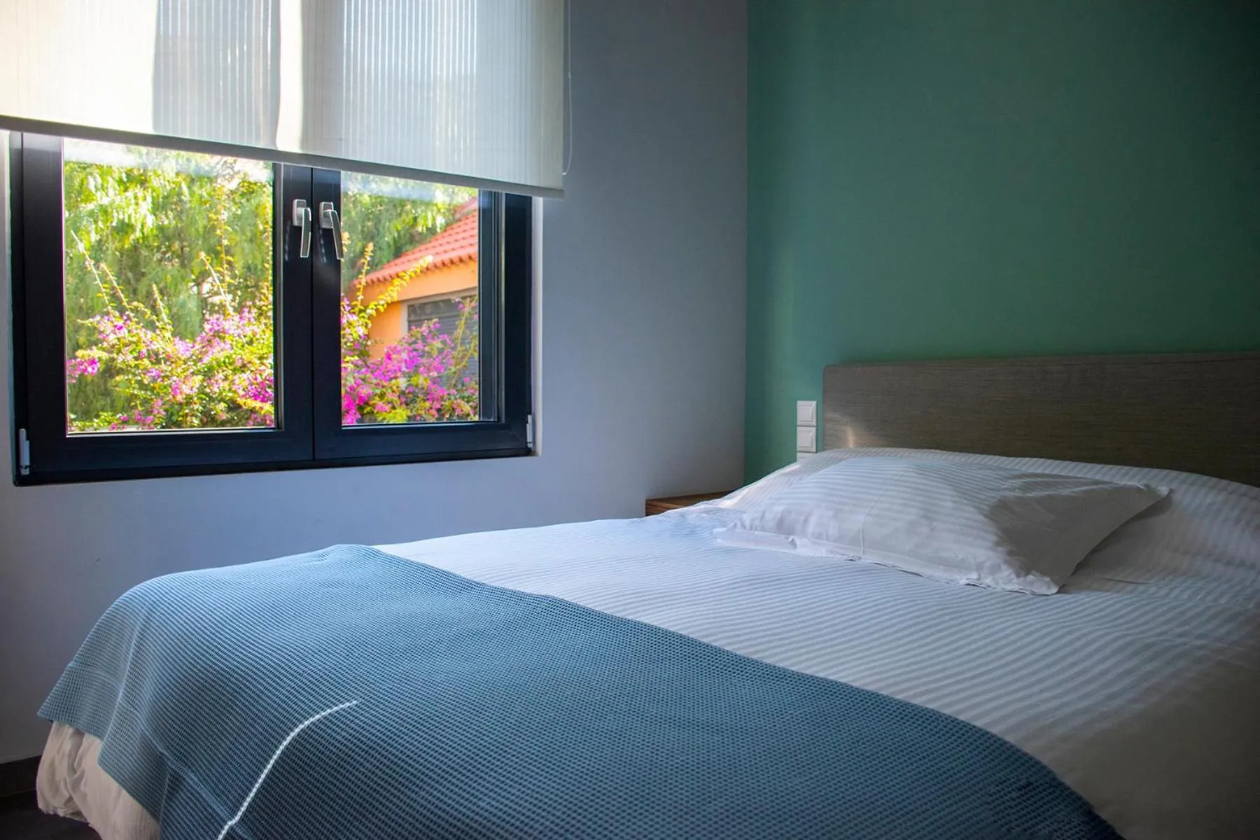 Bed in Derveni Luxury Apartments