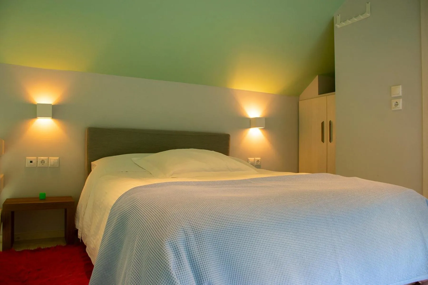 Bed in Derveni Luxury Apartments