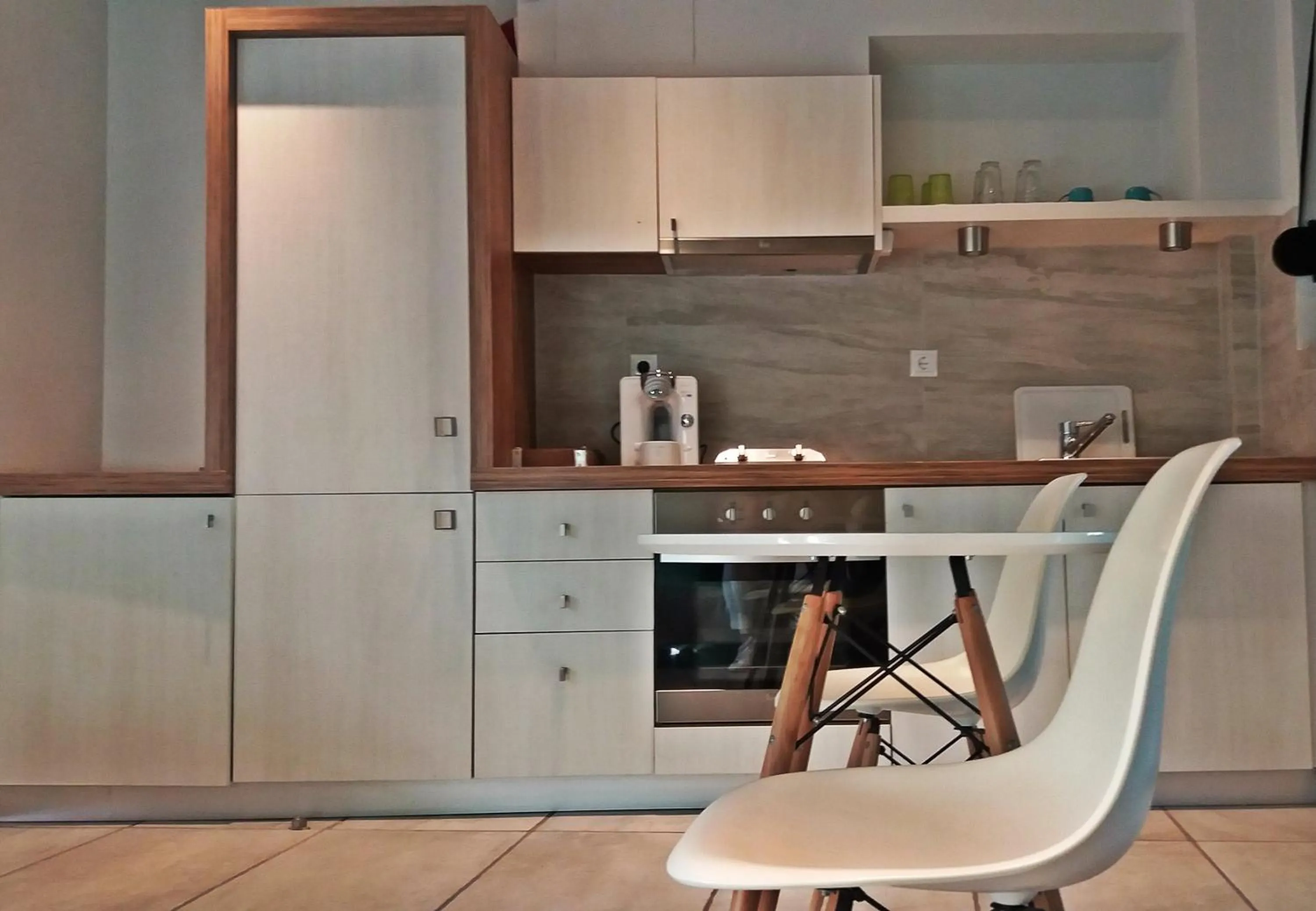 Kitchen or kitchenette in Derveni Luxury Apartments