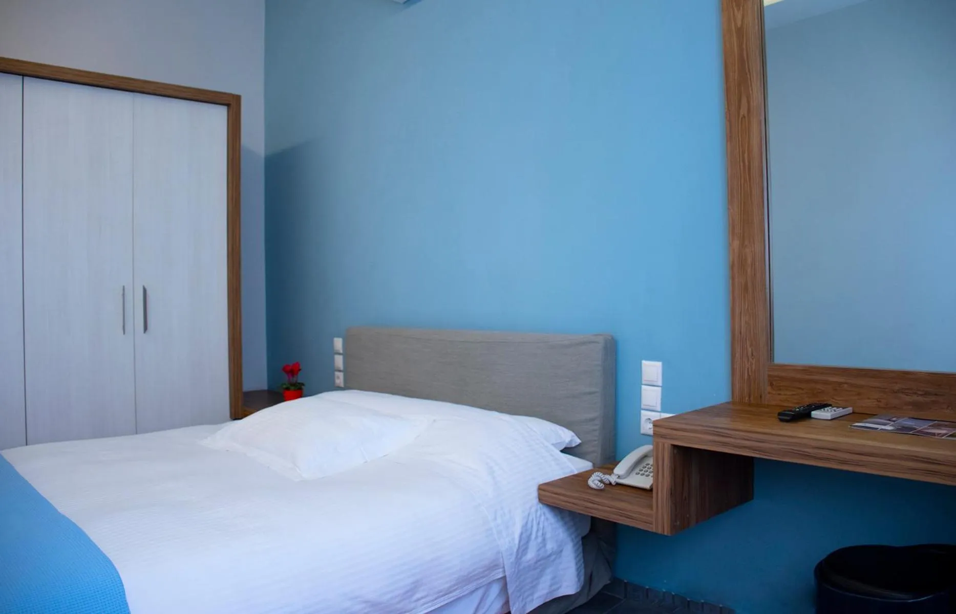 Bed in Derveni Luxury Apartments