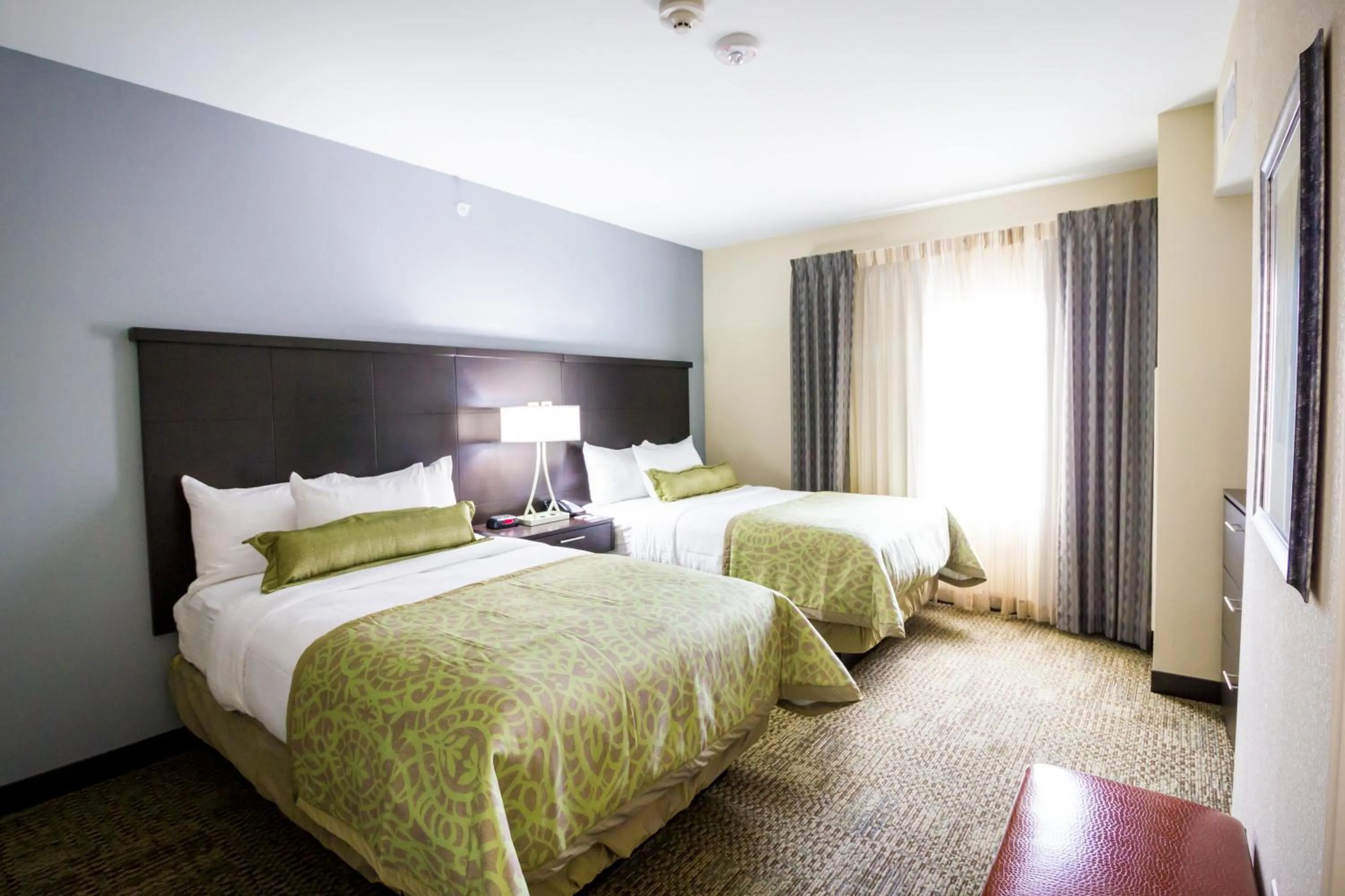 Photo of the whole room, Bed in Staybridge Suites Plano - Legacy West Area by IHG