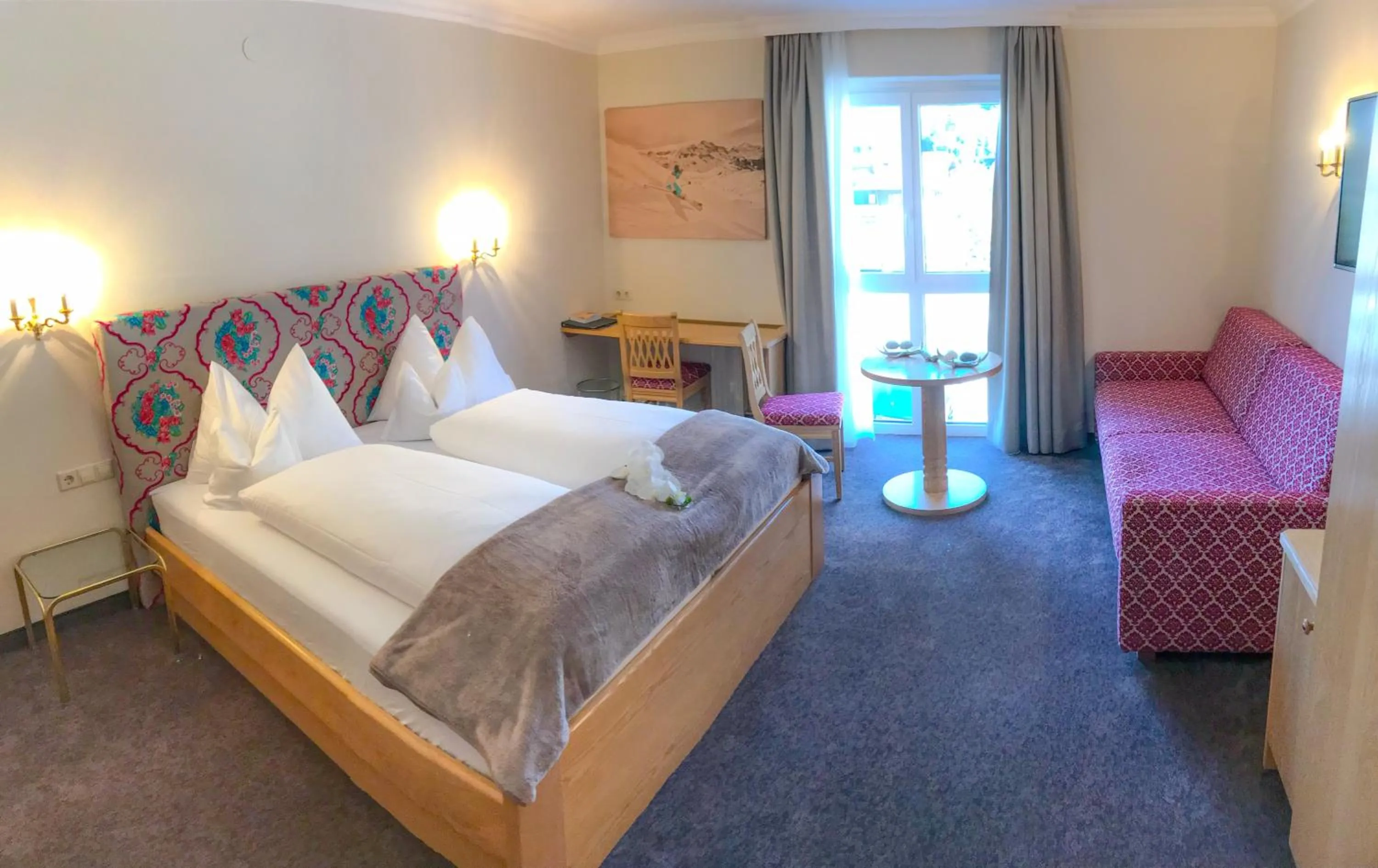 Bed in Andi's Skihotel