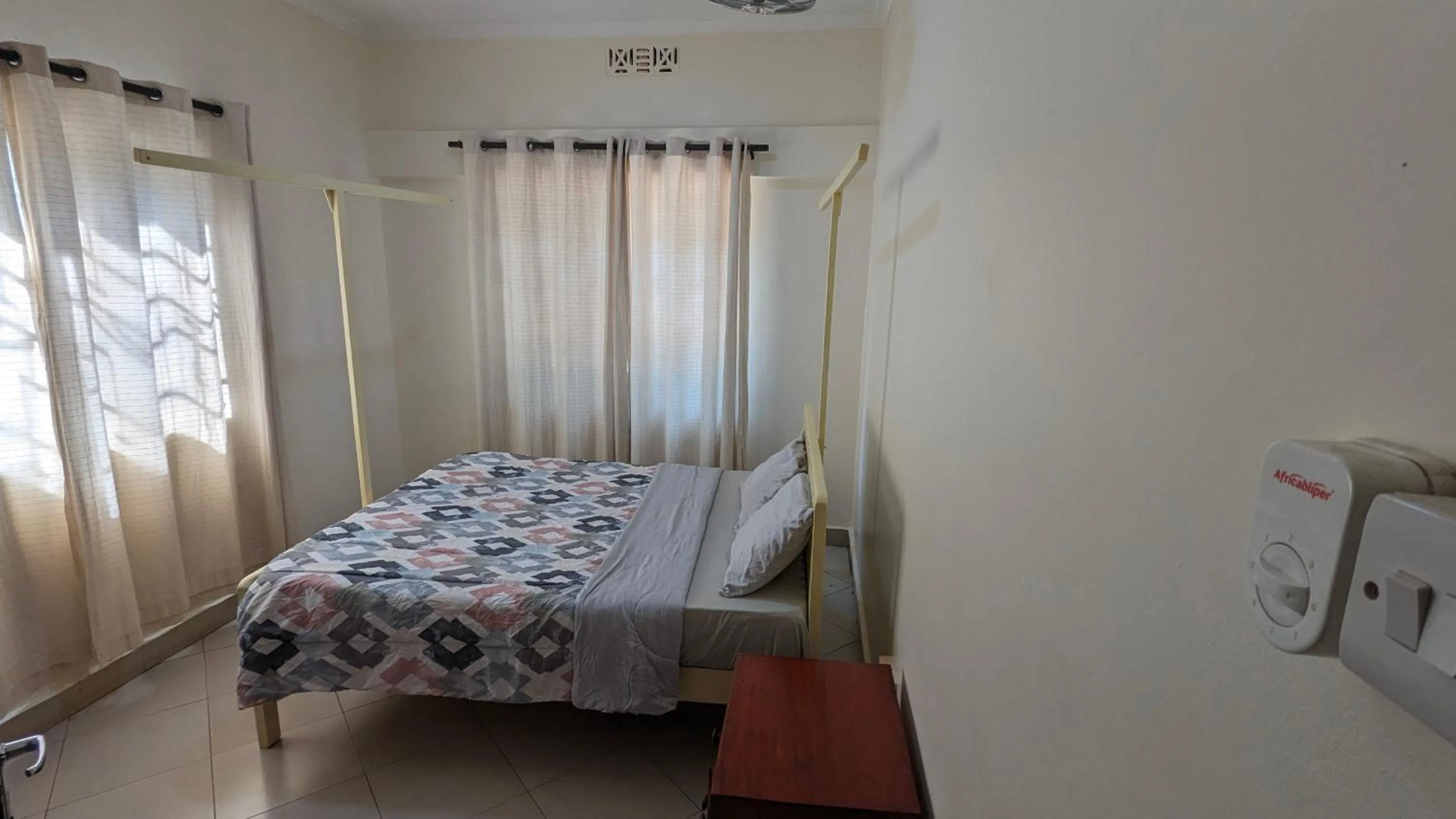 Bed in JACARANDA HOMESTAY