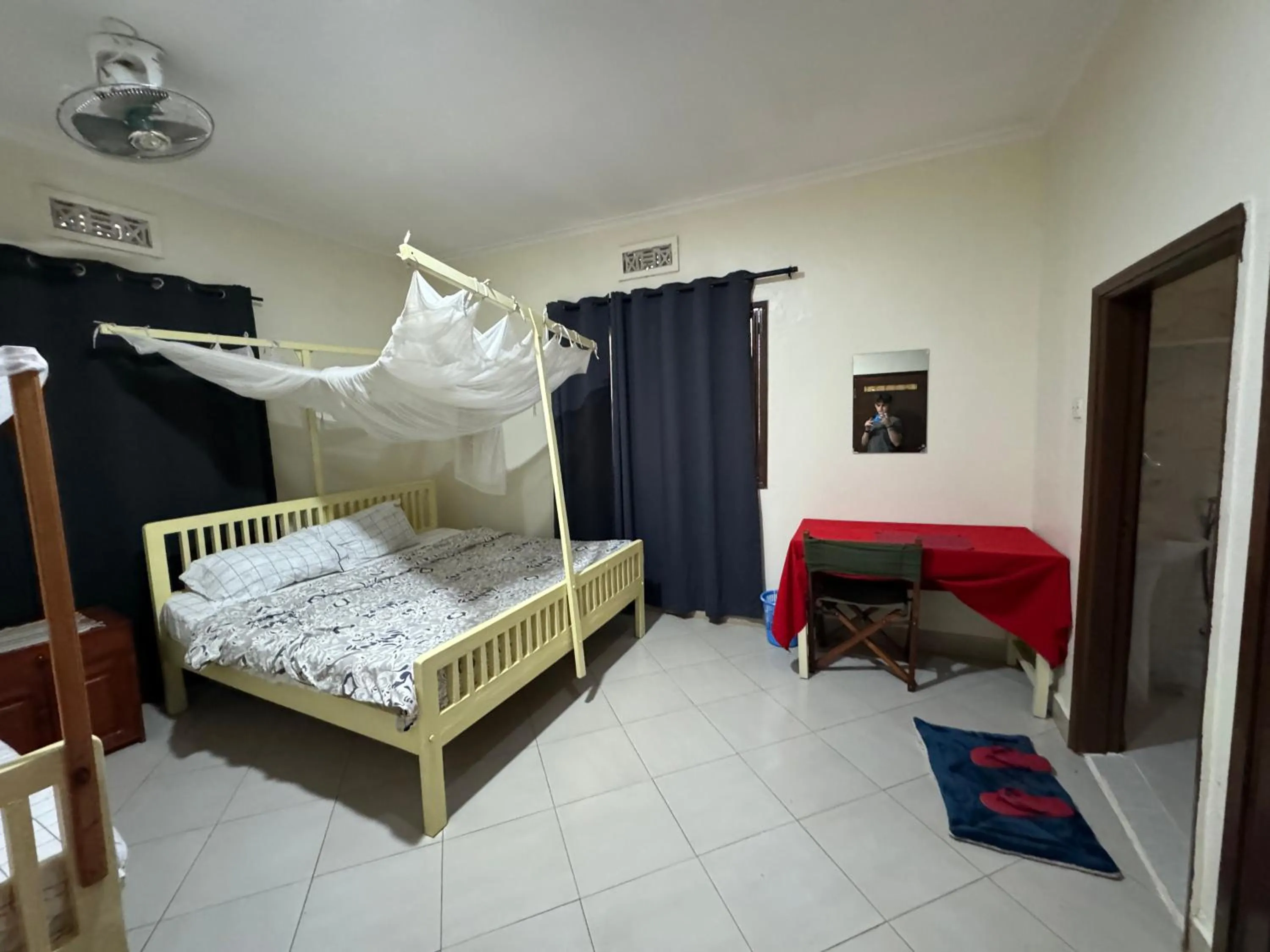 Bed in JACARANDA HOMESTAY