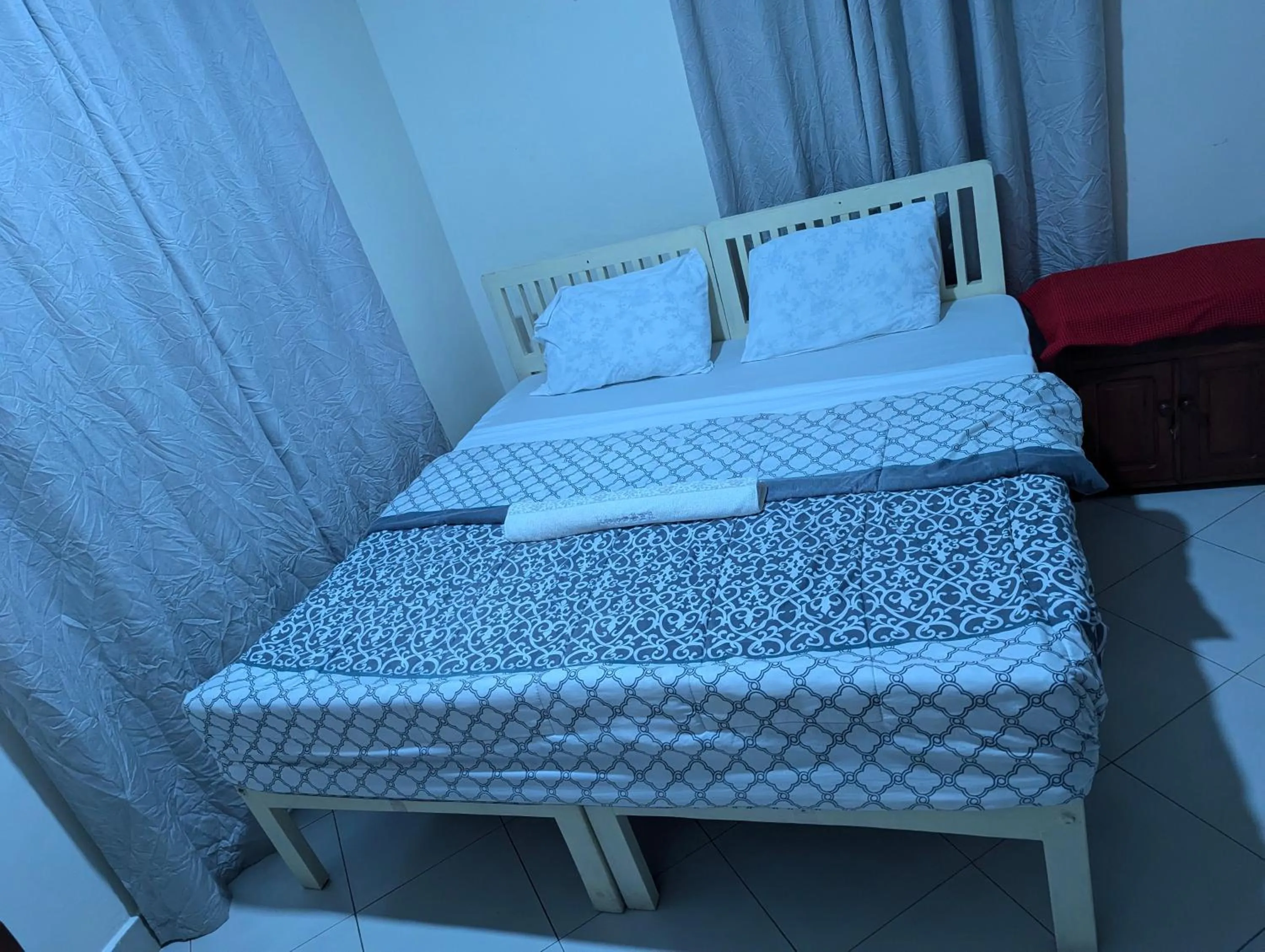 Bed in JACARANDA HOMESTAY