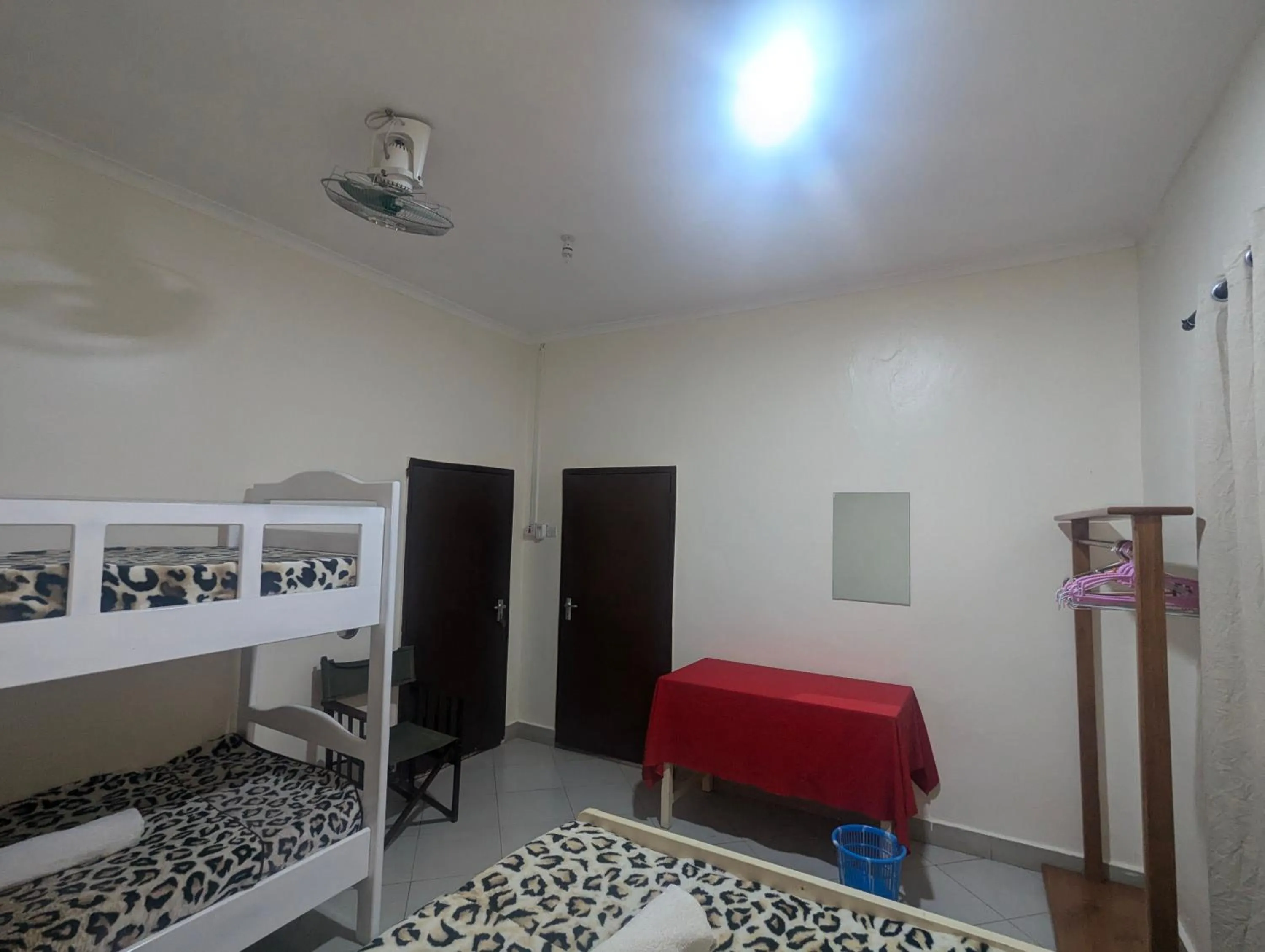 Bed in JACARANDA HOMESTAY