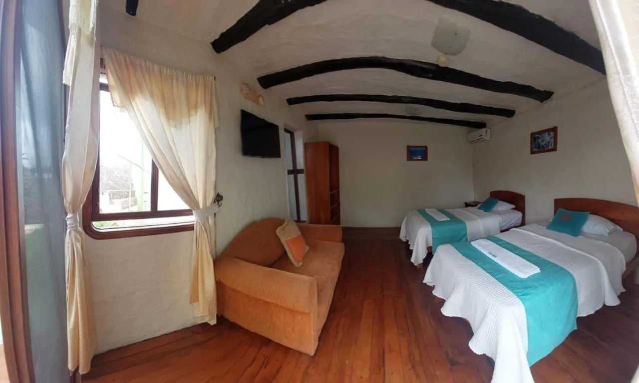 Bed in Hostal Casa Edén