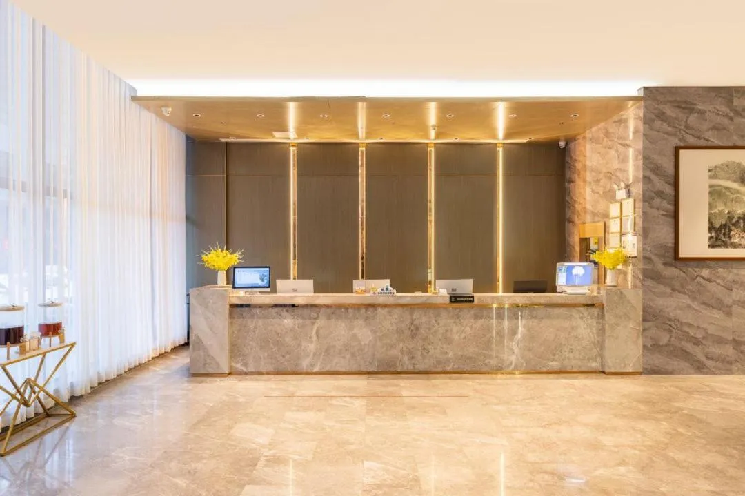 Lobby or reception in Echarm Hotel Haikou