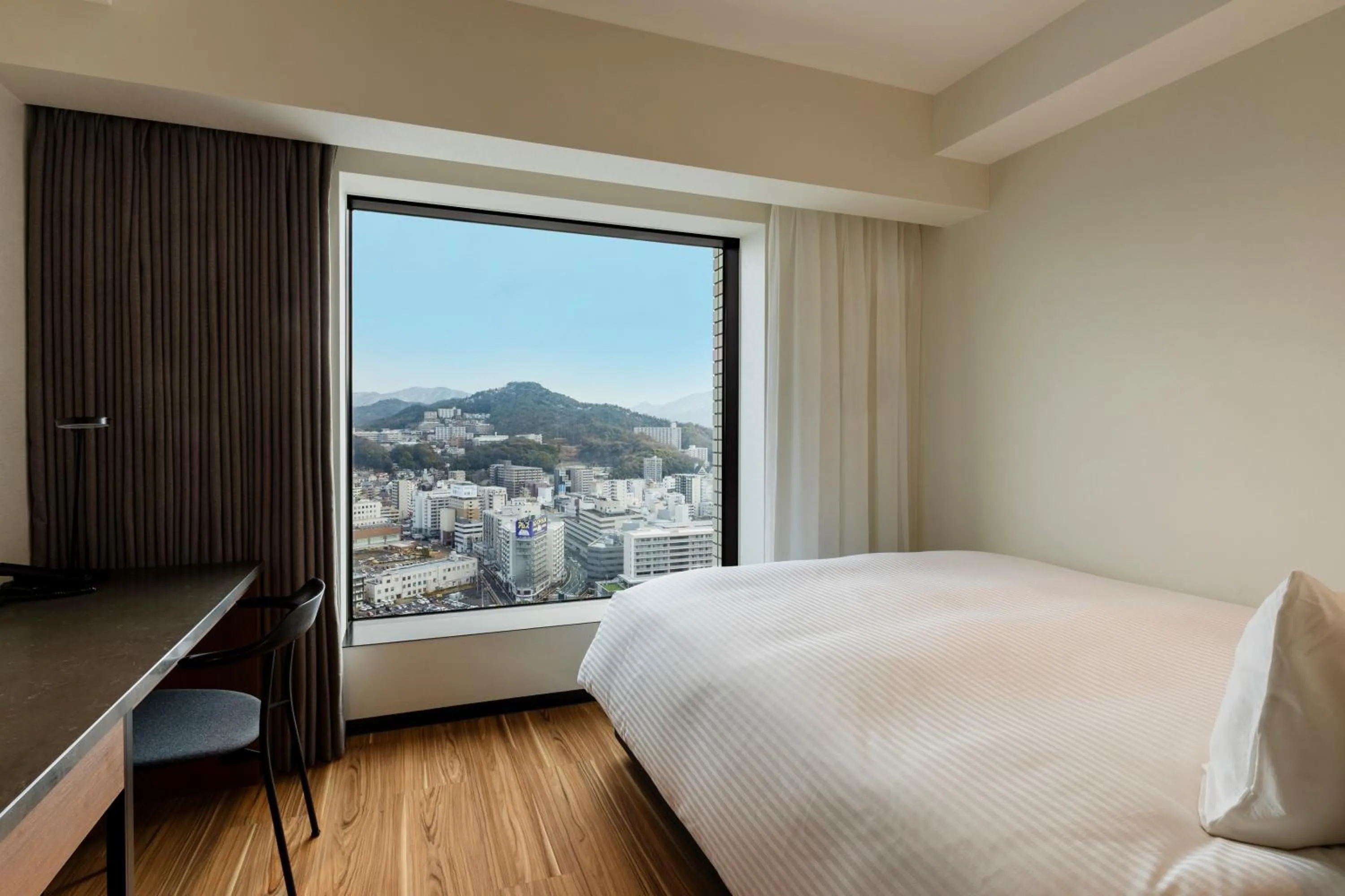 Bed in HOTEL GRANVIA HIROSHIMA SOUTH GATE