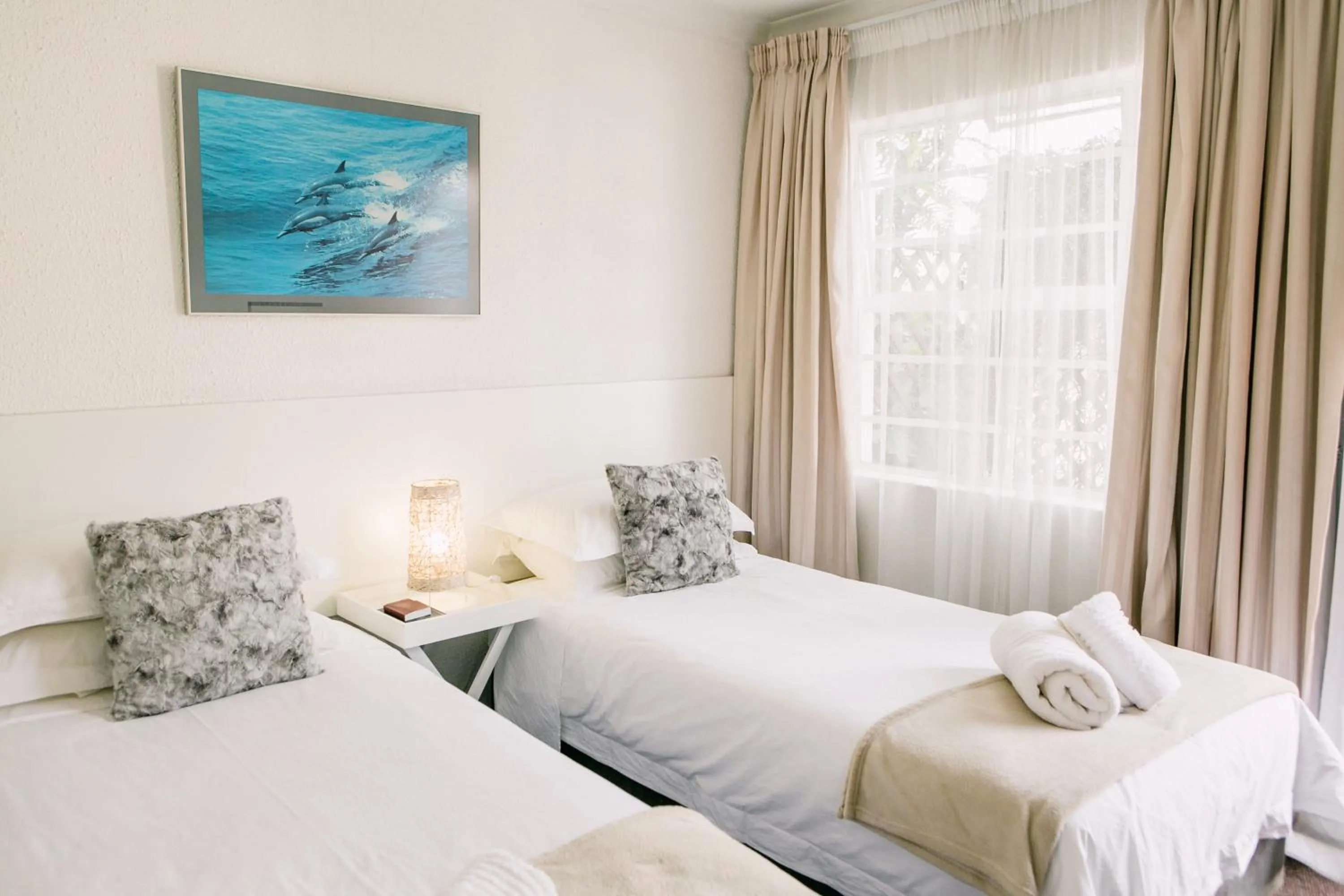 Bed in Pennylane Guest House