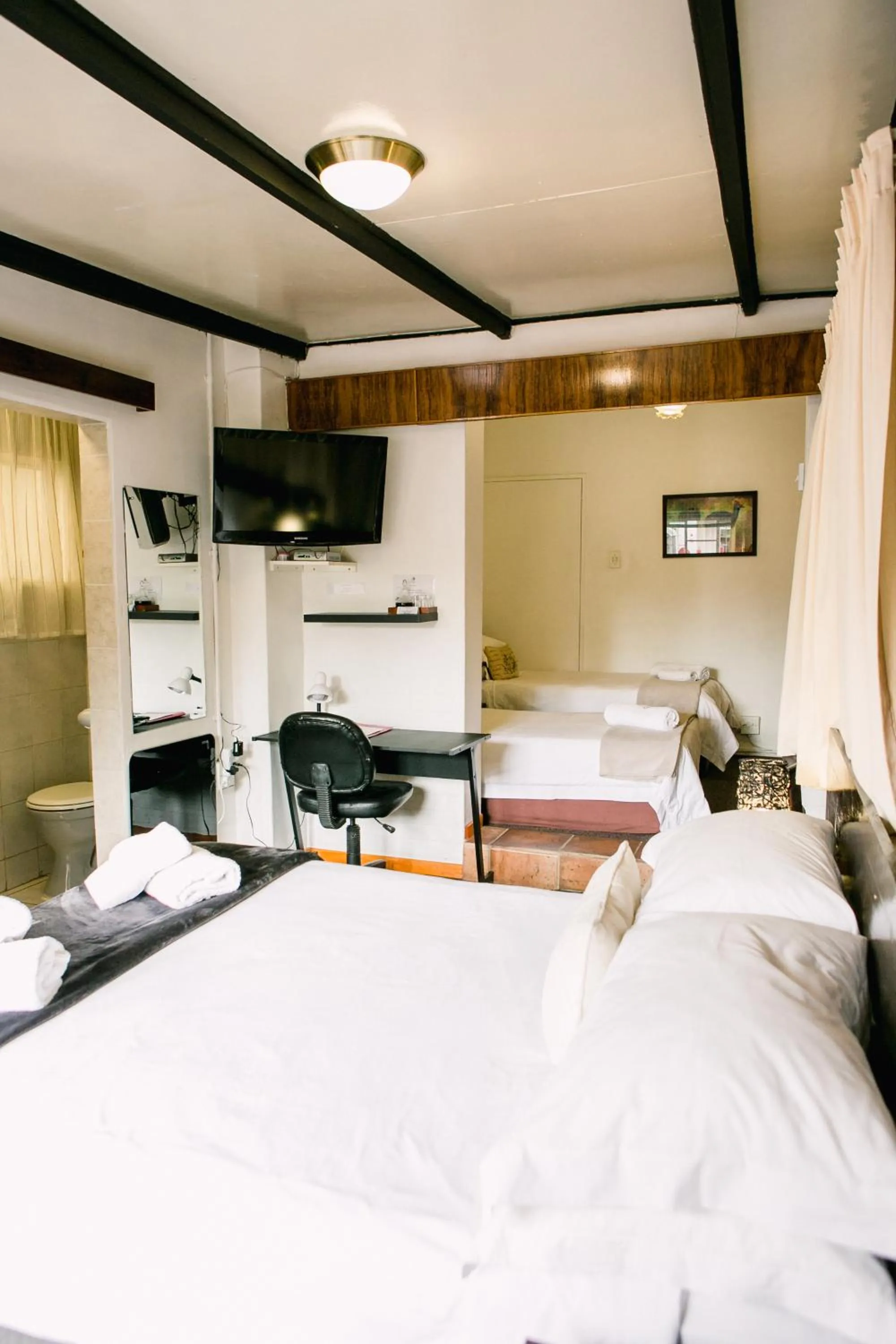 Photo of the whole room, Bed in Pennylane Guest House