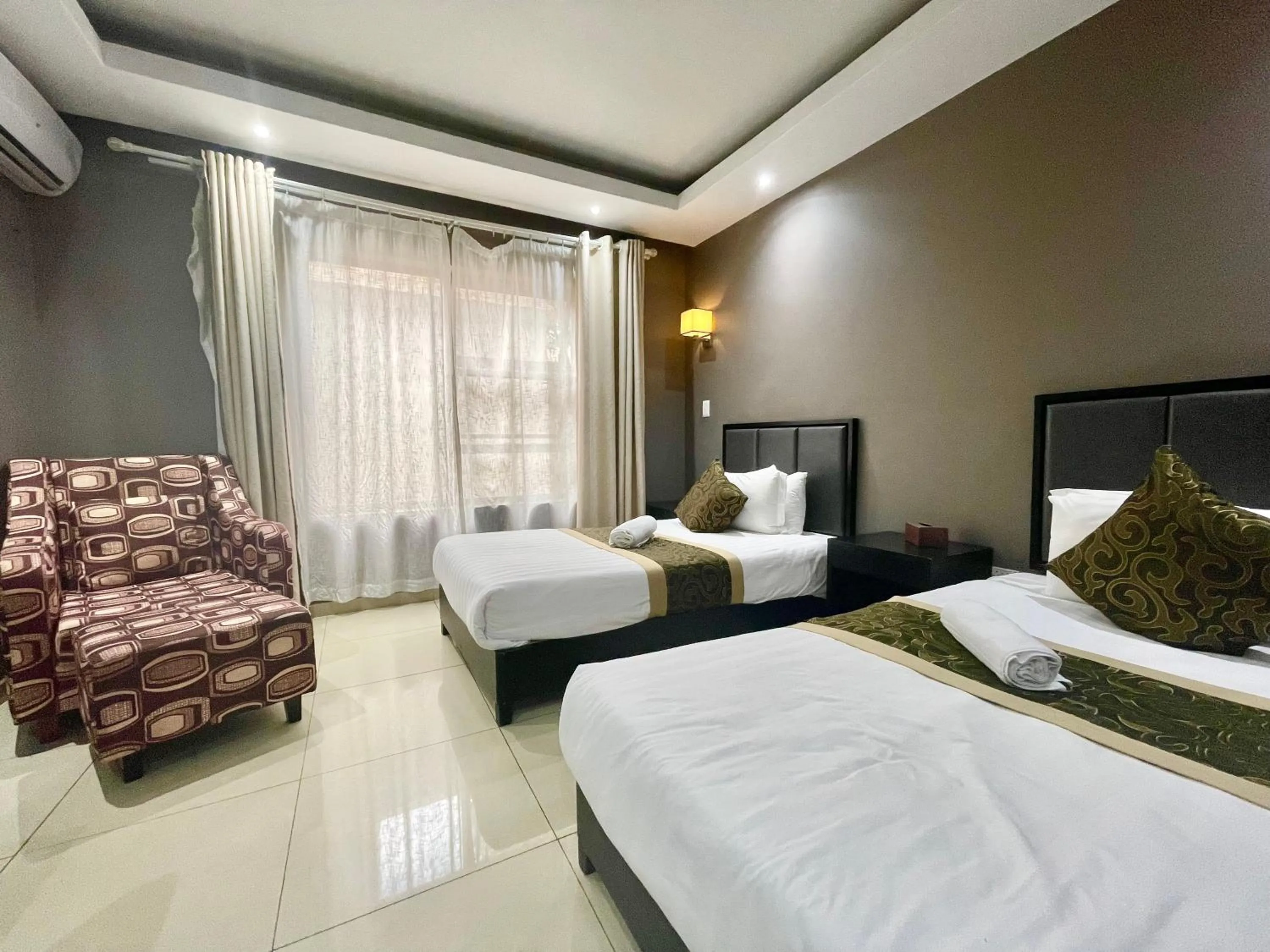 Bed in Azinnia Rivonia Guest House