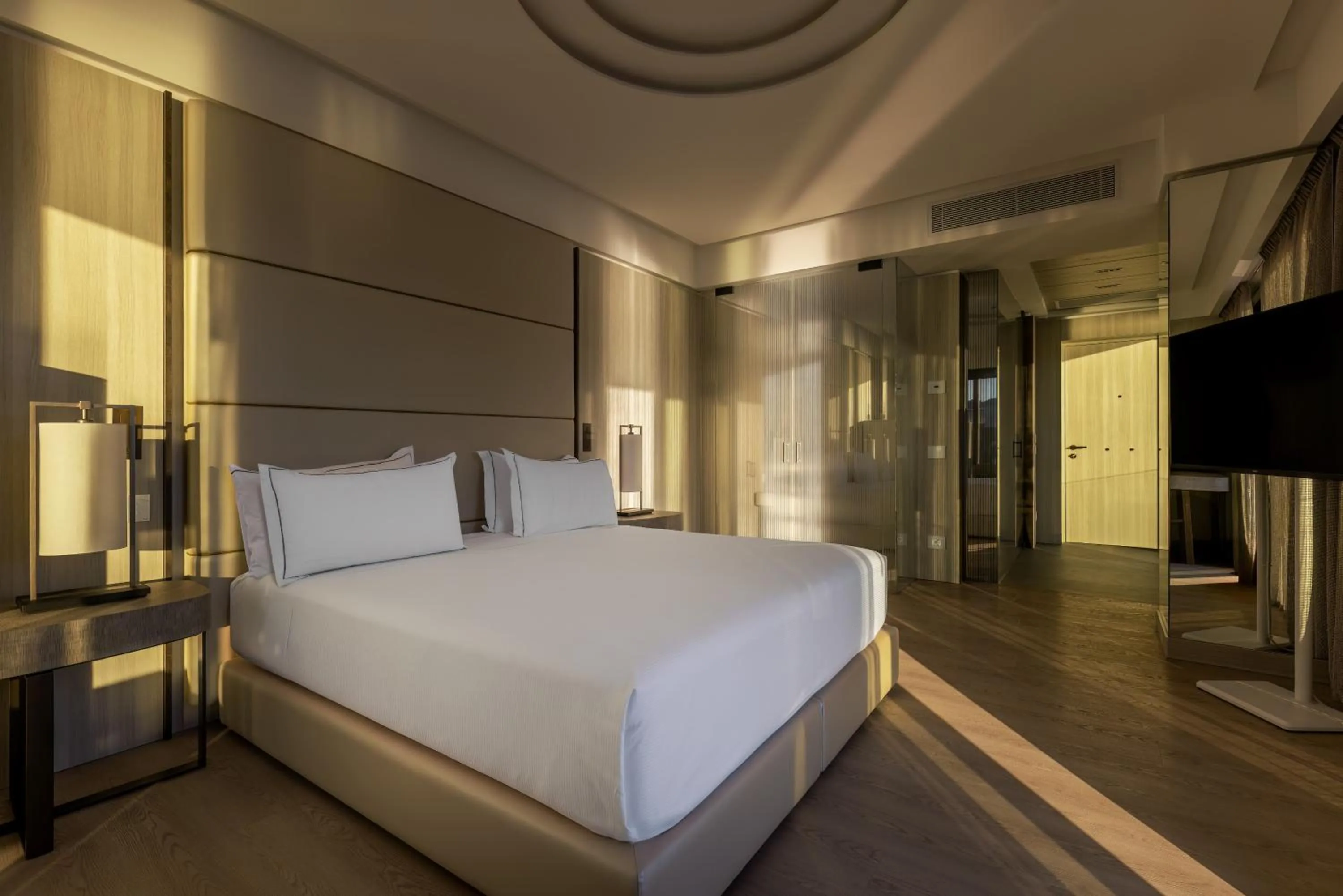 Bed in Porto Lotti Suite Hotel