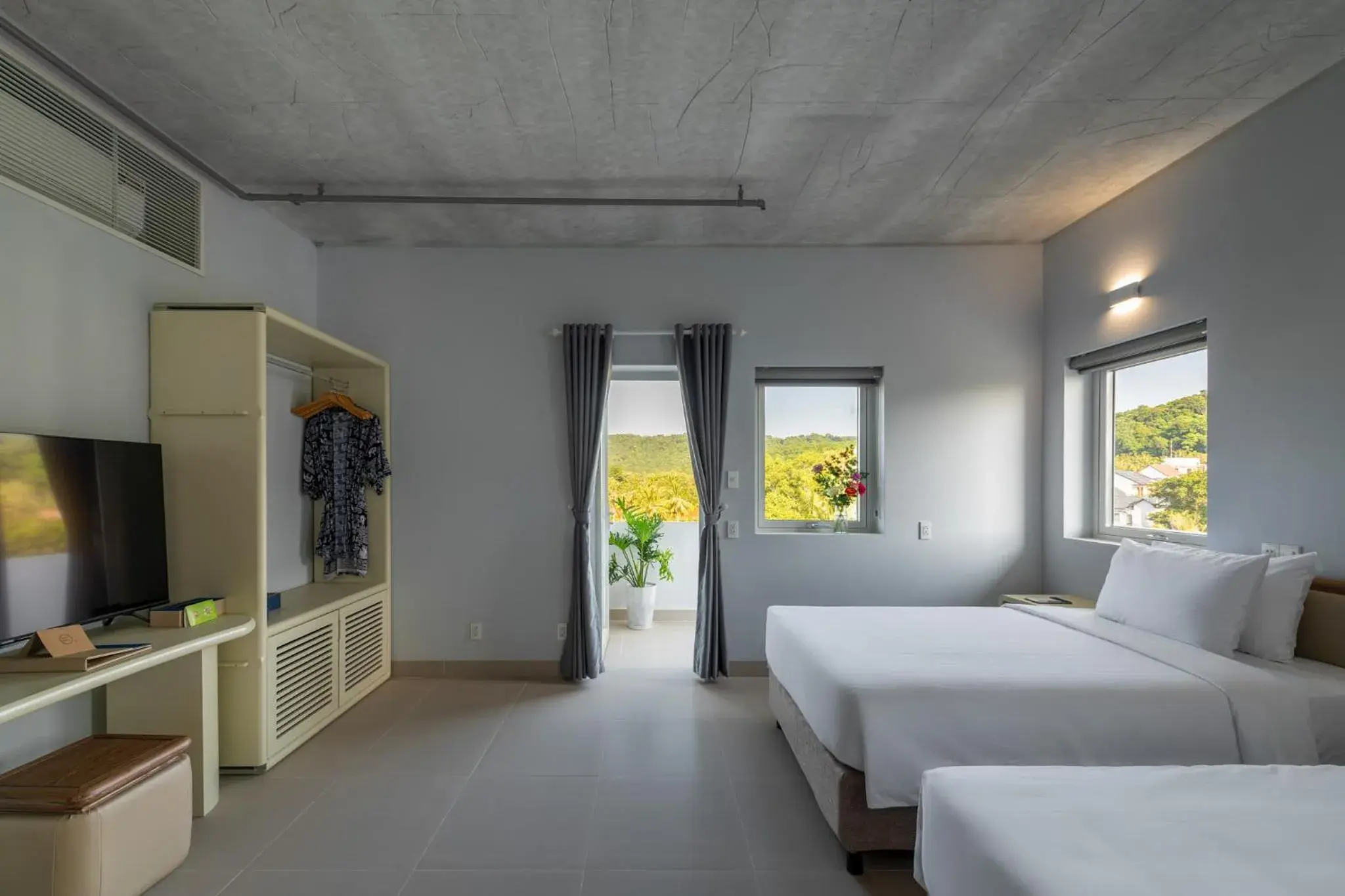 Deluxe Twin Room With Balcony in The Up Phu Quoc Deluxe Twin Room With Balcony in The Up Phu Quoc