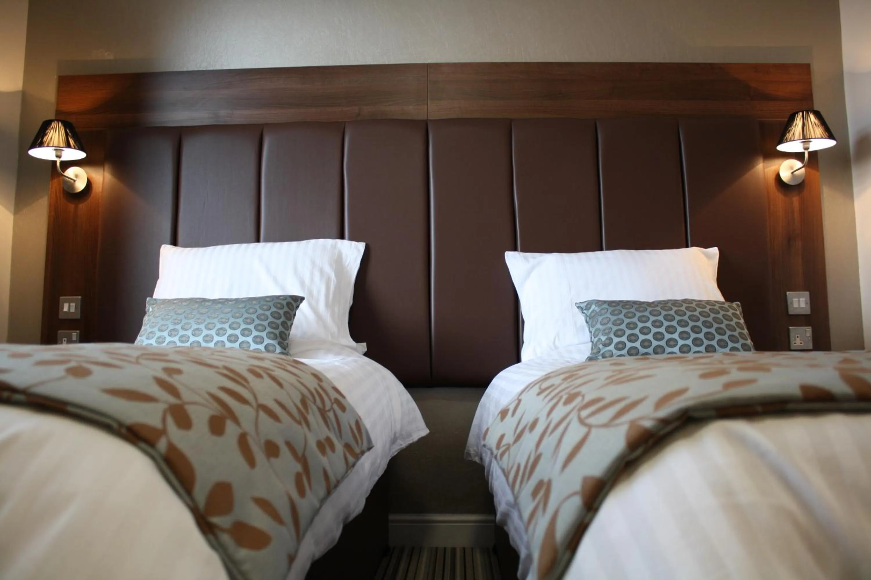 Bed in Twin Oaks Hotel