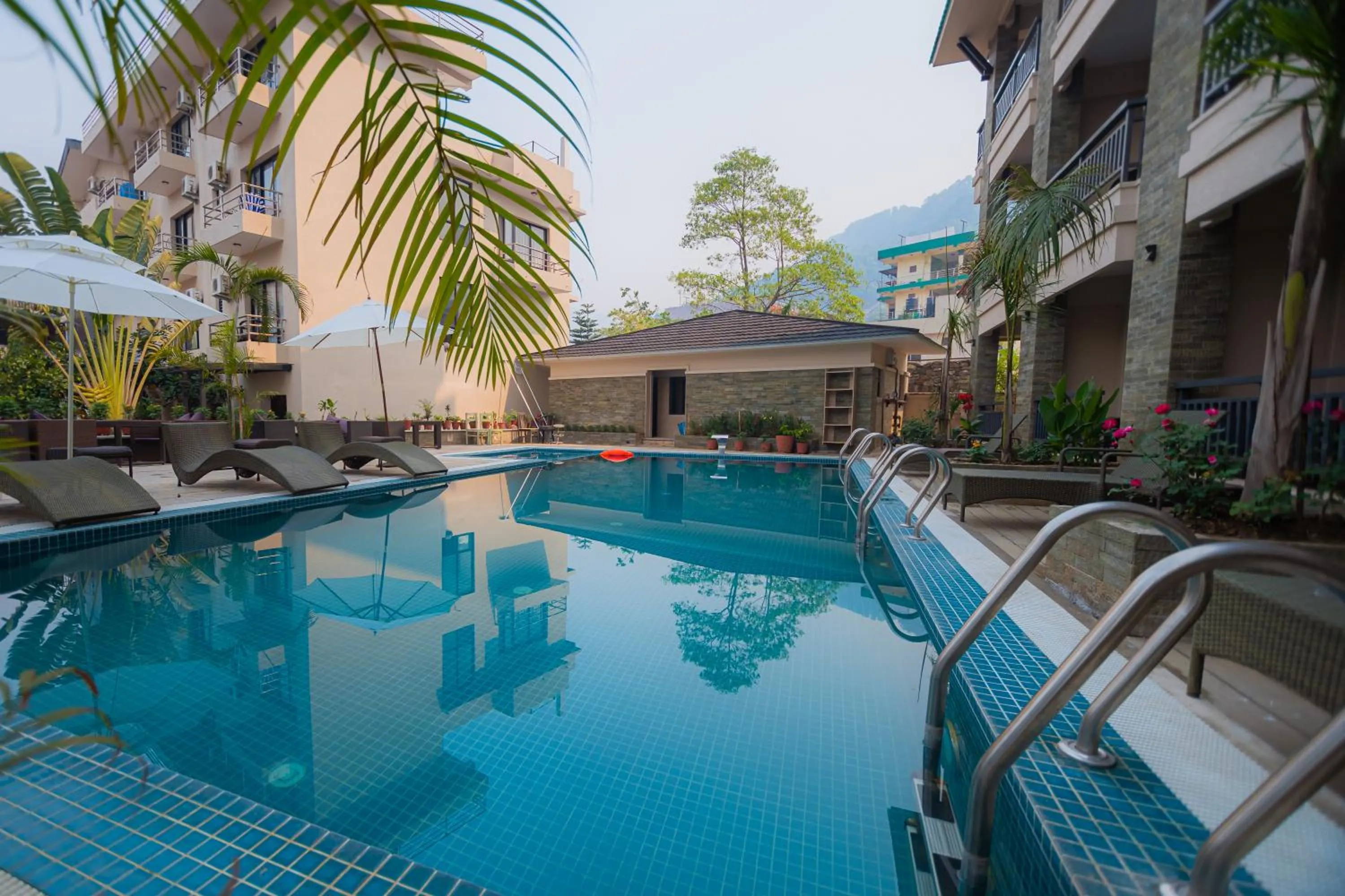 Swimming pool in Hotel Pokhara Village & SPA