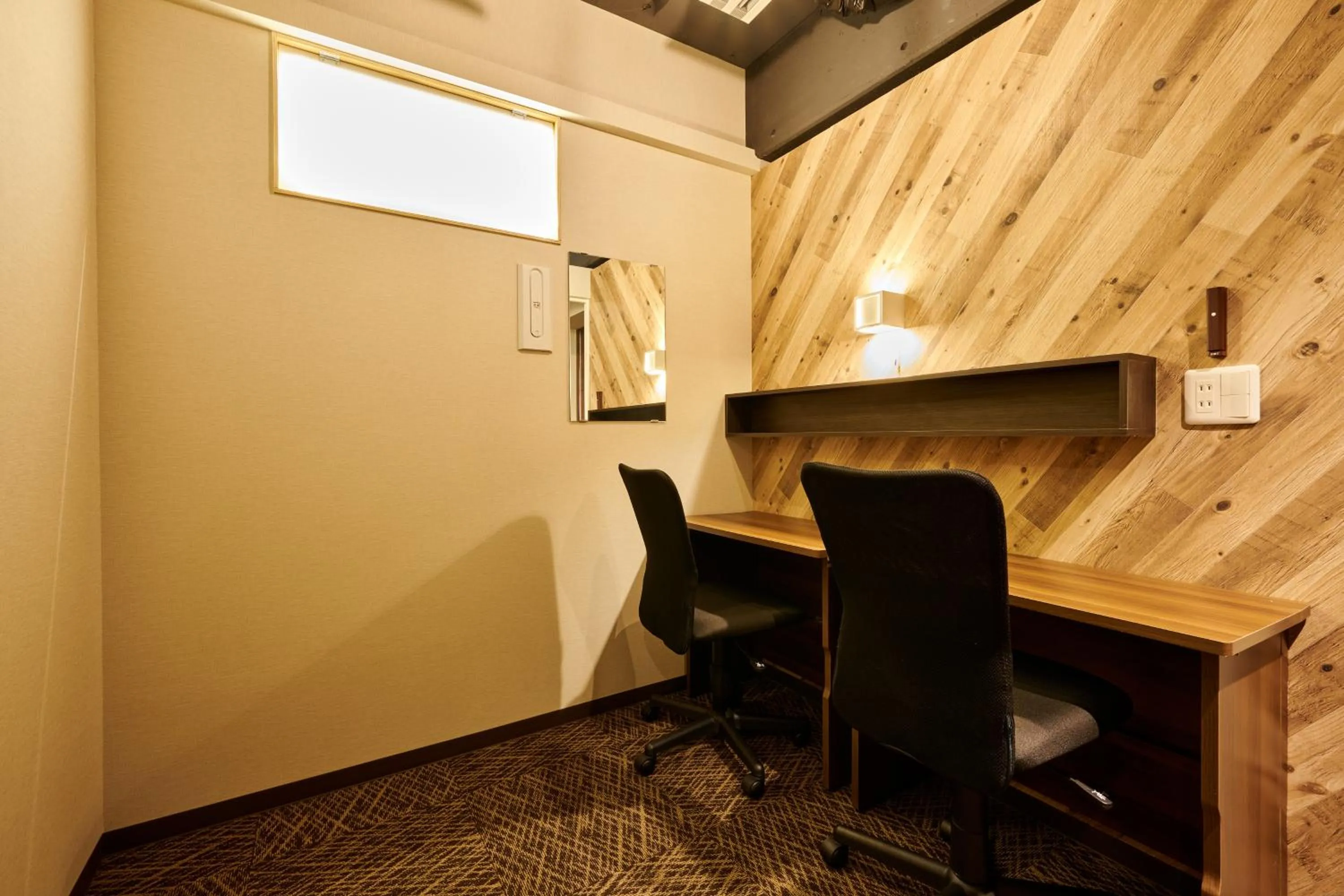 Communal lounge/ TV room in CAPSULE HOTEL CONTINUE NijojoKita