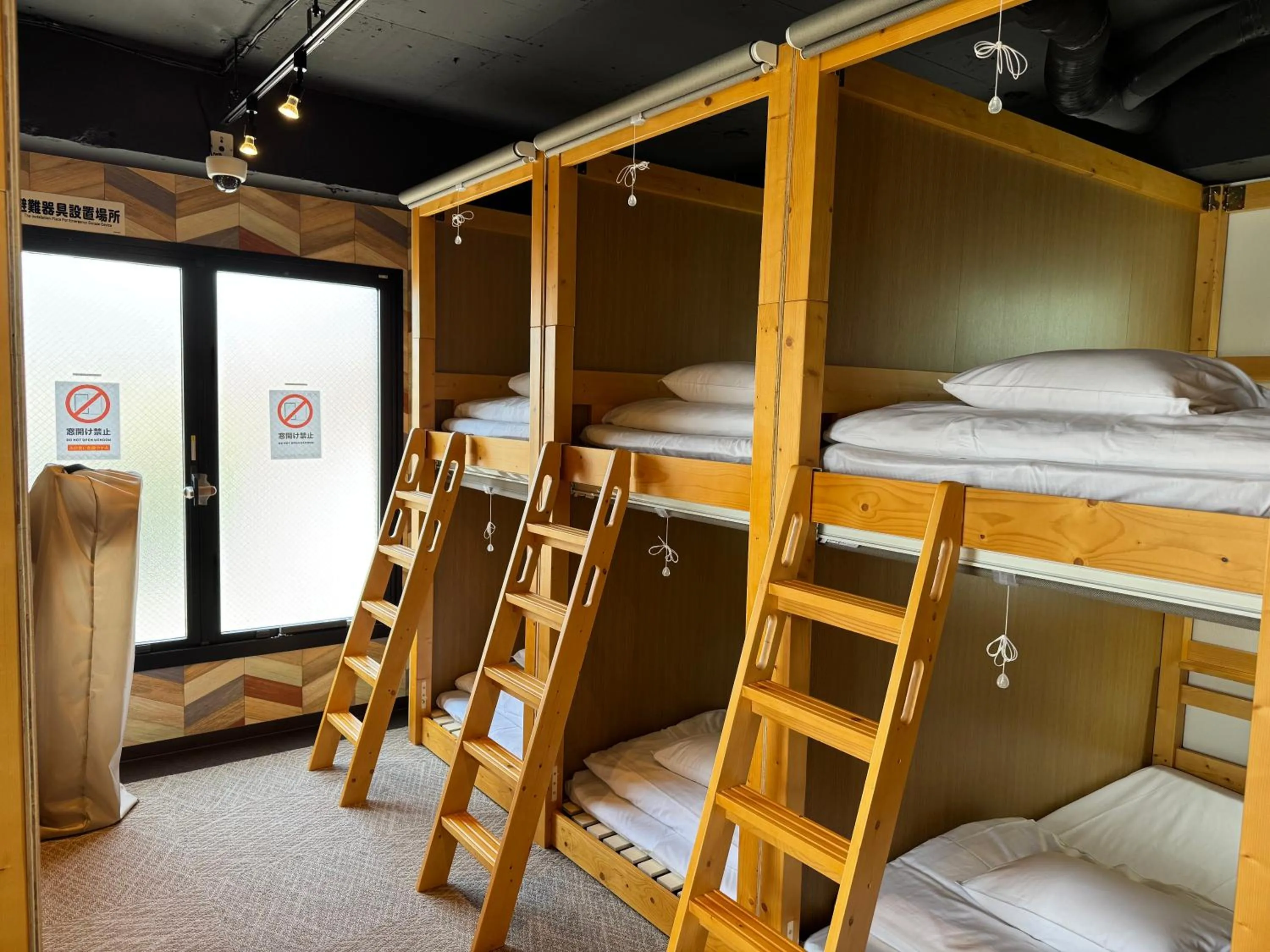Photo of the whole room, Bed in CAPSULE HOTEL CONTINUE NijojoKita