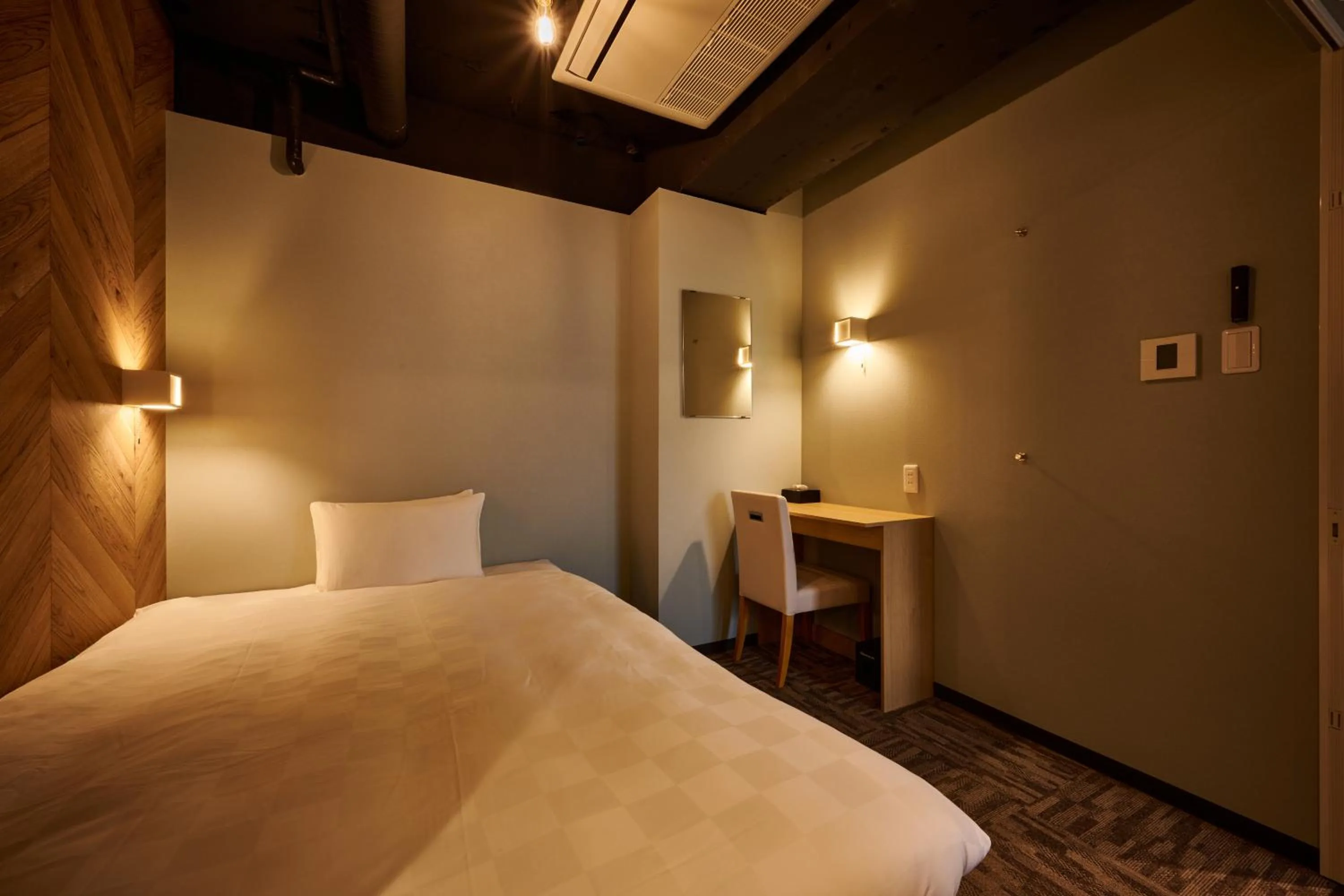 Photo of the whole room, Bed in CAPSULE HOTEL CONTINUE NijojoKita