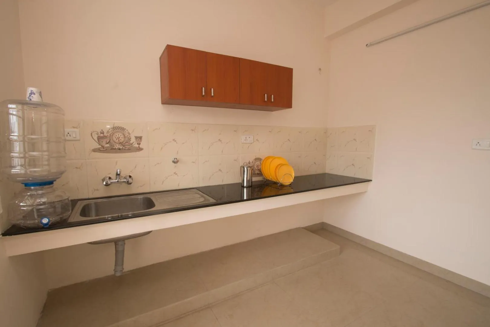Kitchen or kitchenette in ThulasiRams Service Apartments