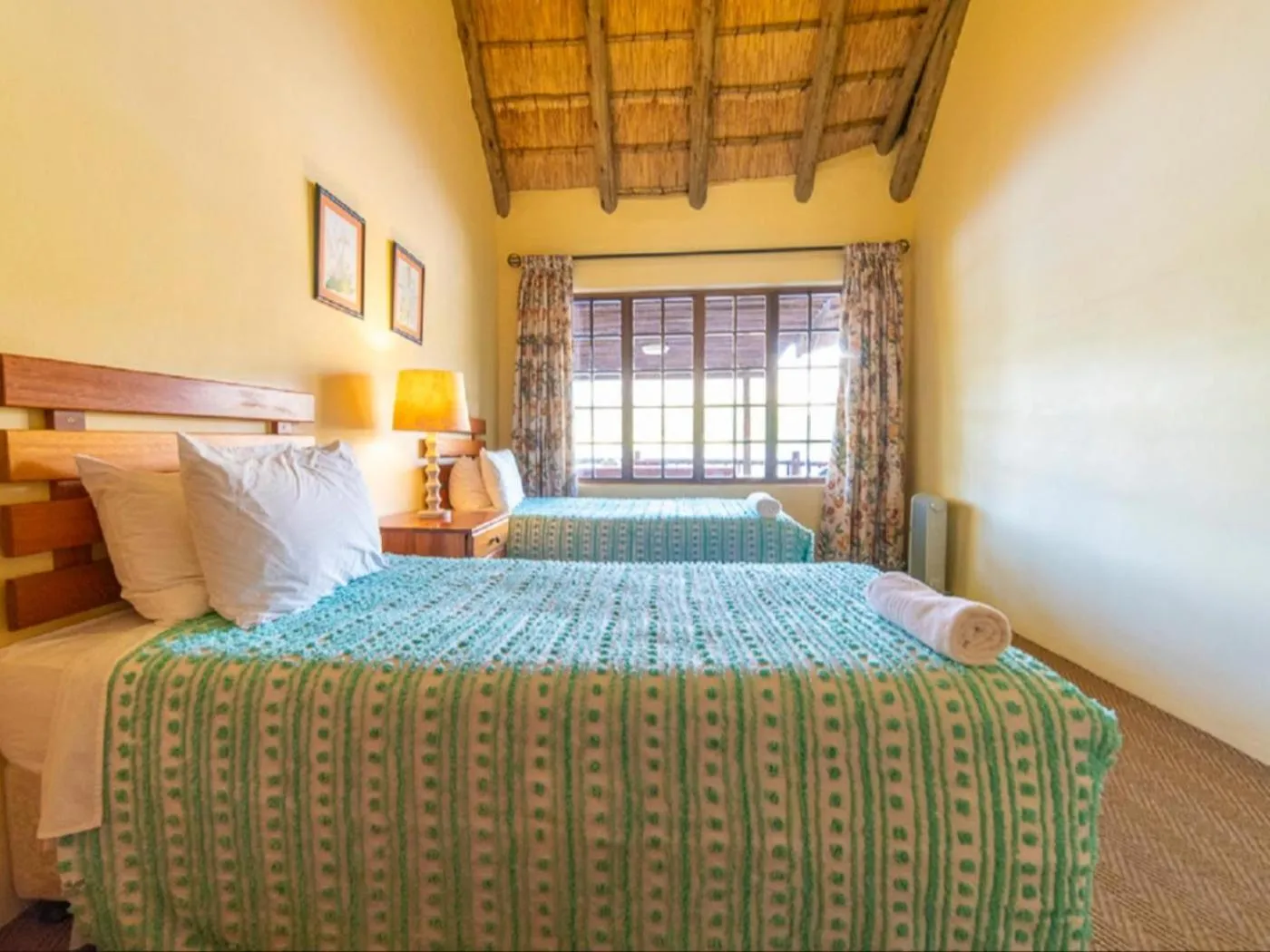 Bed in Lake Naverone Holiday Cottages