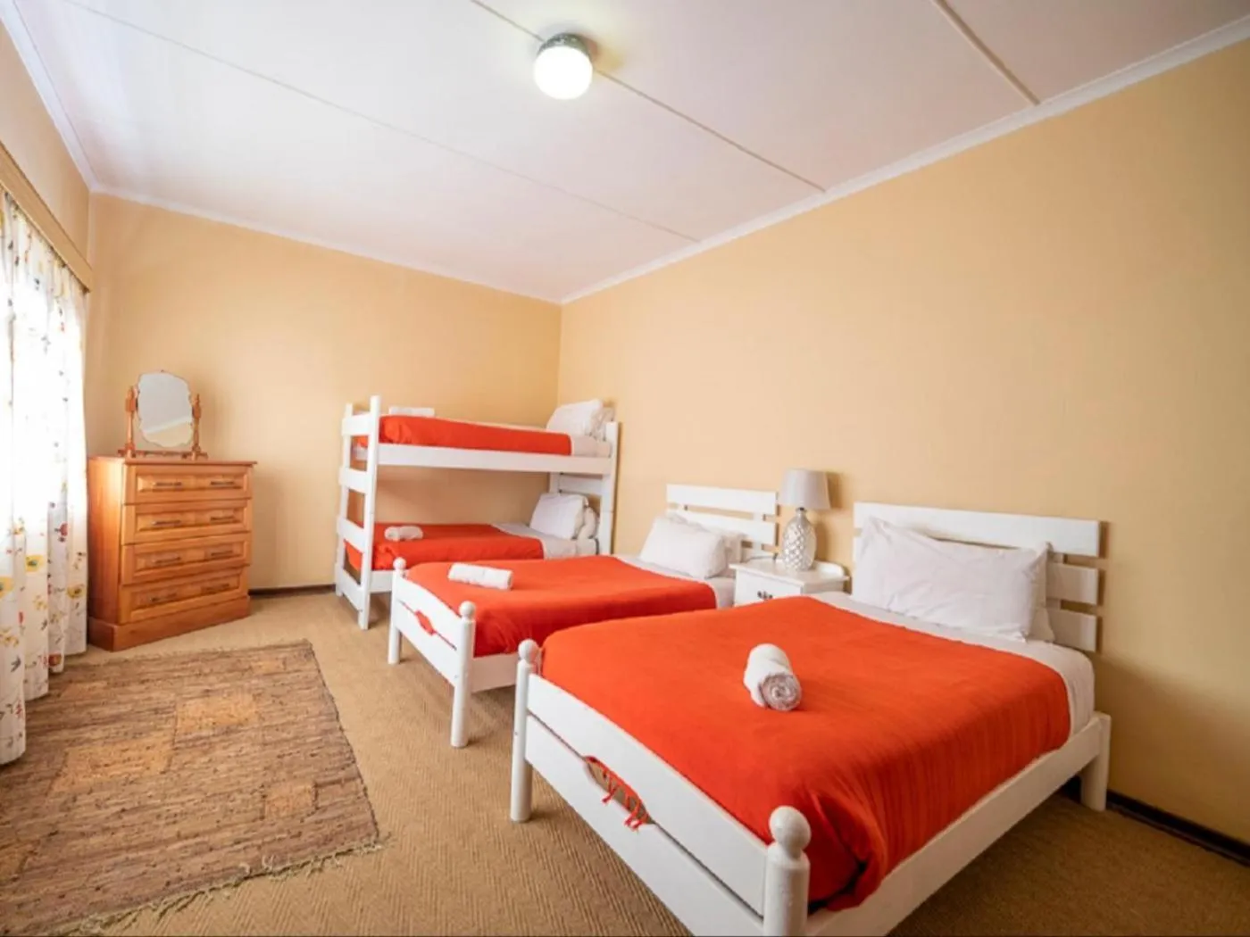 Bed in Lake Naverone Holiday Cottages