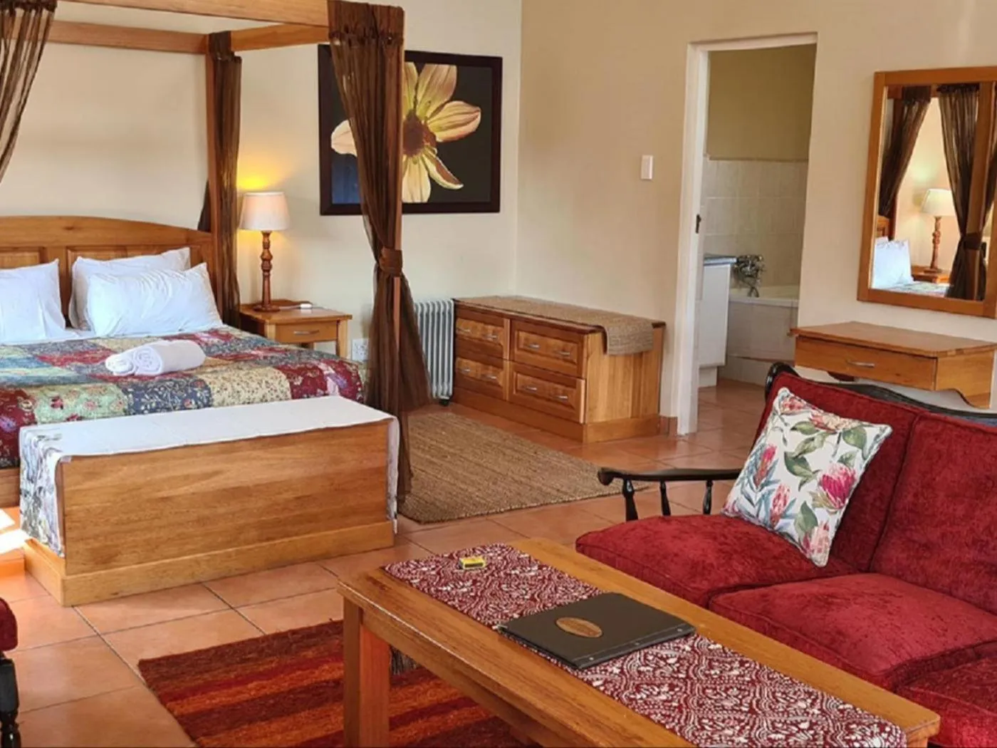 Seating area, Bed in Lake Naverone Holiday Cottages