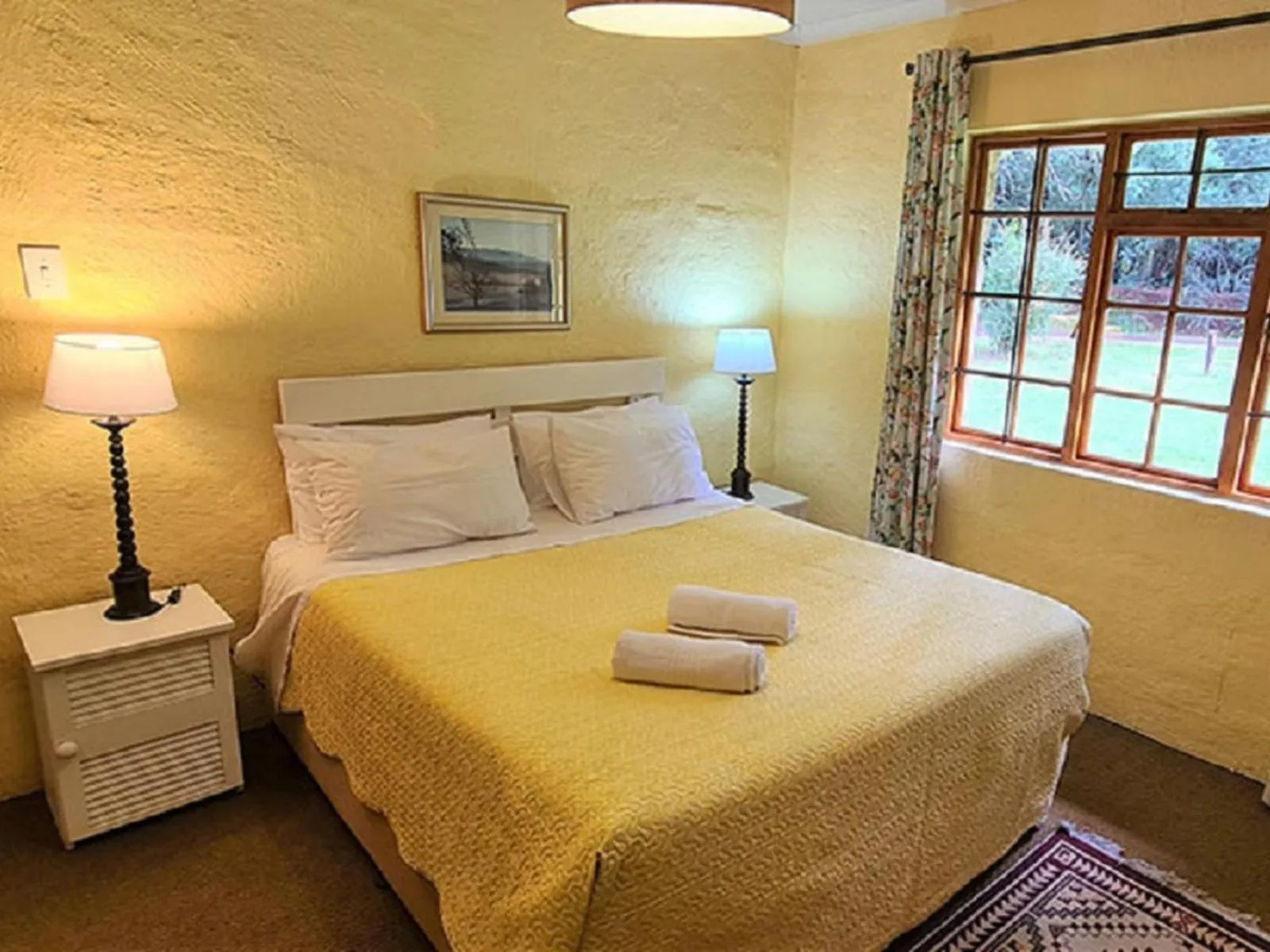 Bed in Lake Naverone Holiday Cottages