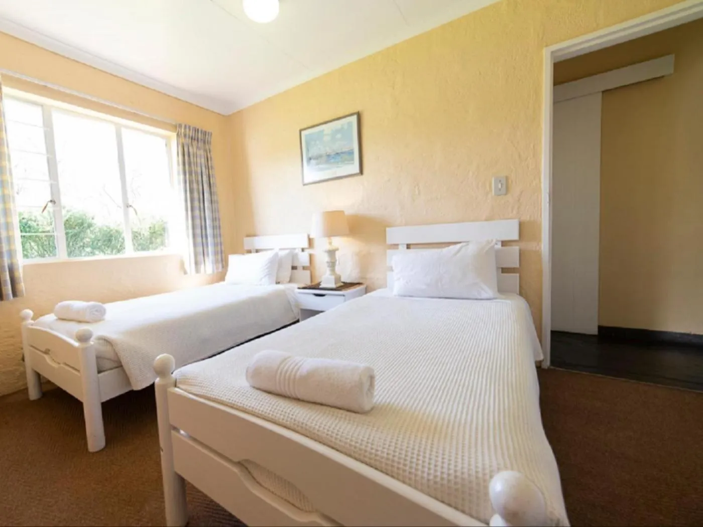 Bed in Lake Naverone Holiday Cottages