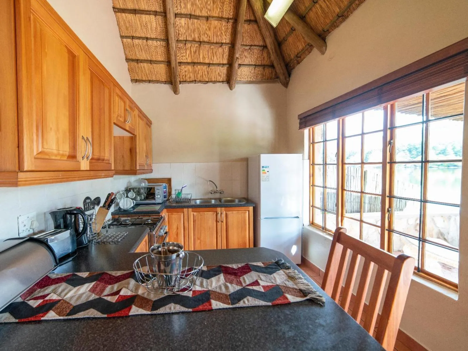 Kitchen or kitchenette in Lake Naverone Holiday Cottages
