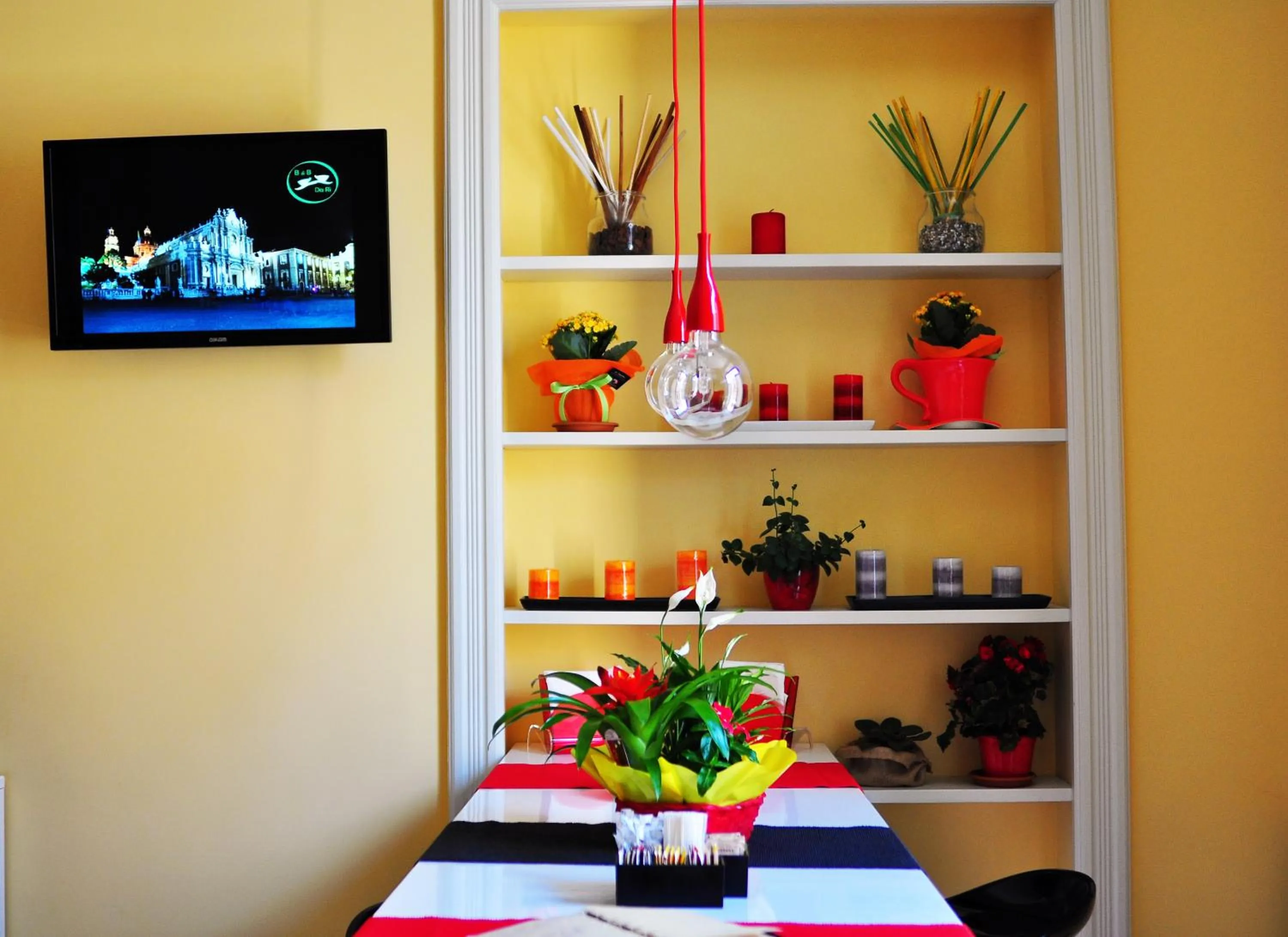 Communal lounge/ TV room in B&B Da Rì