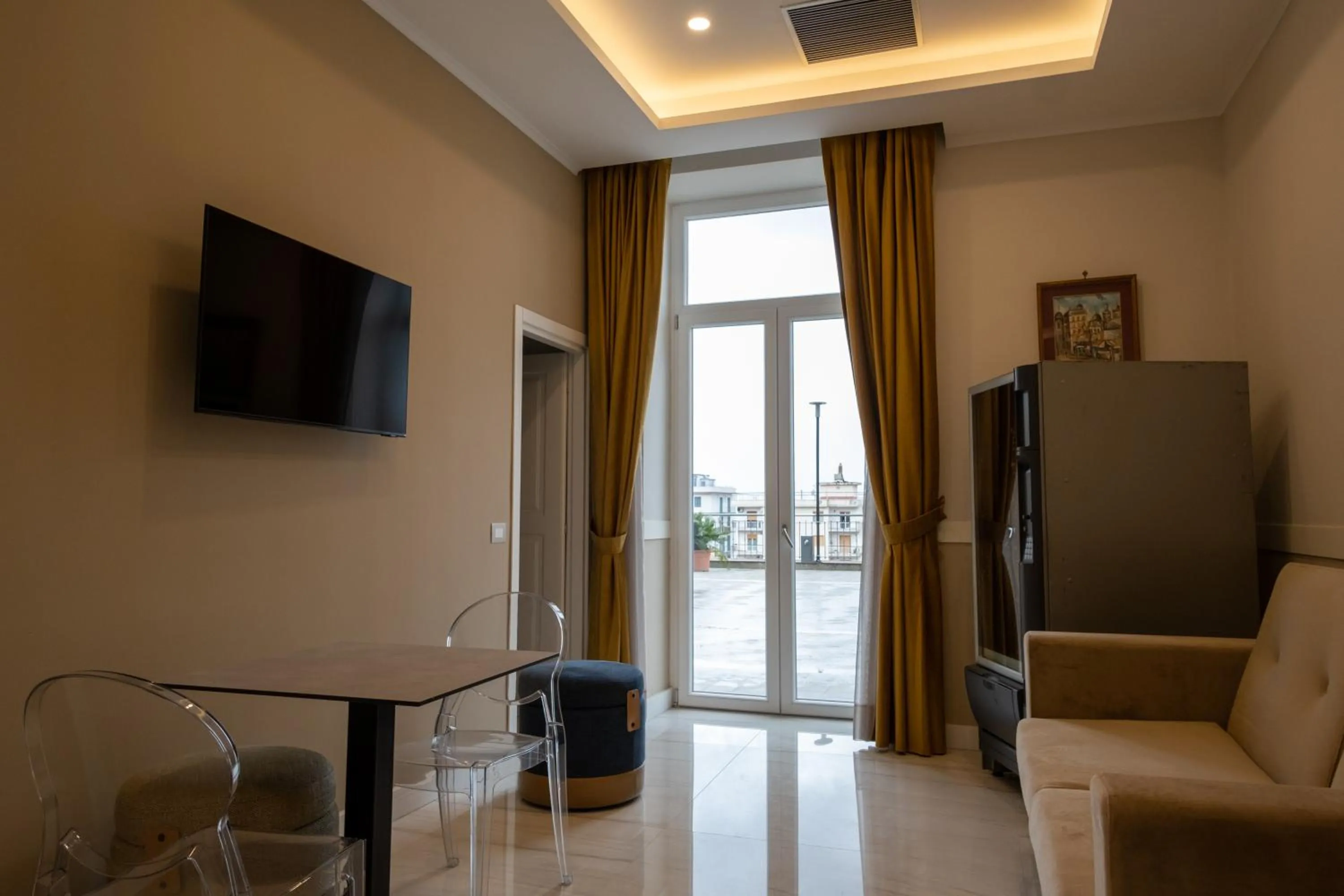 Seating area in Palazzo Adele Rooms & Apartments