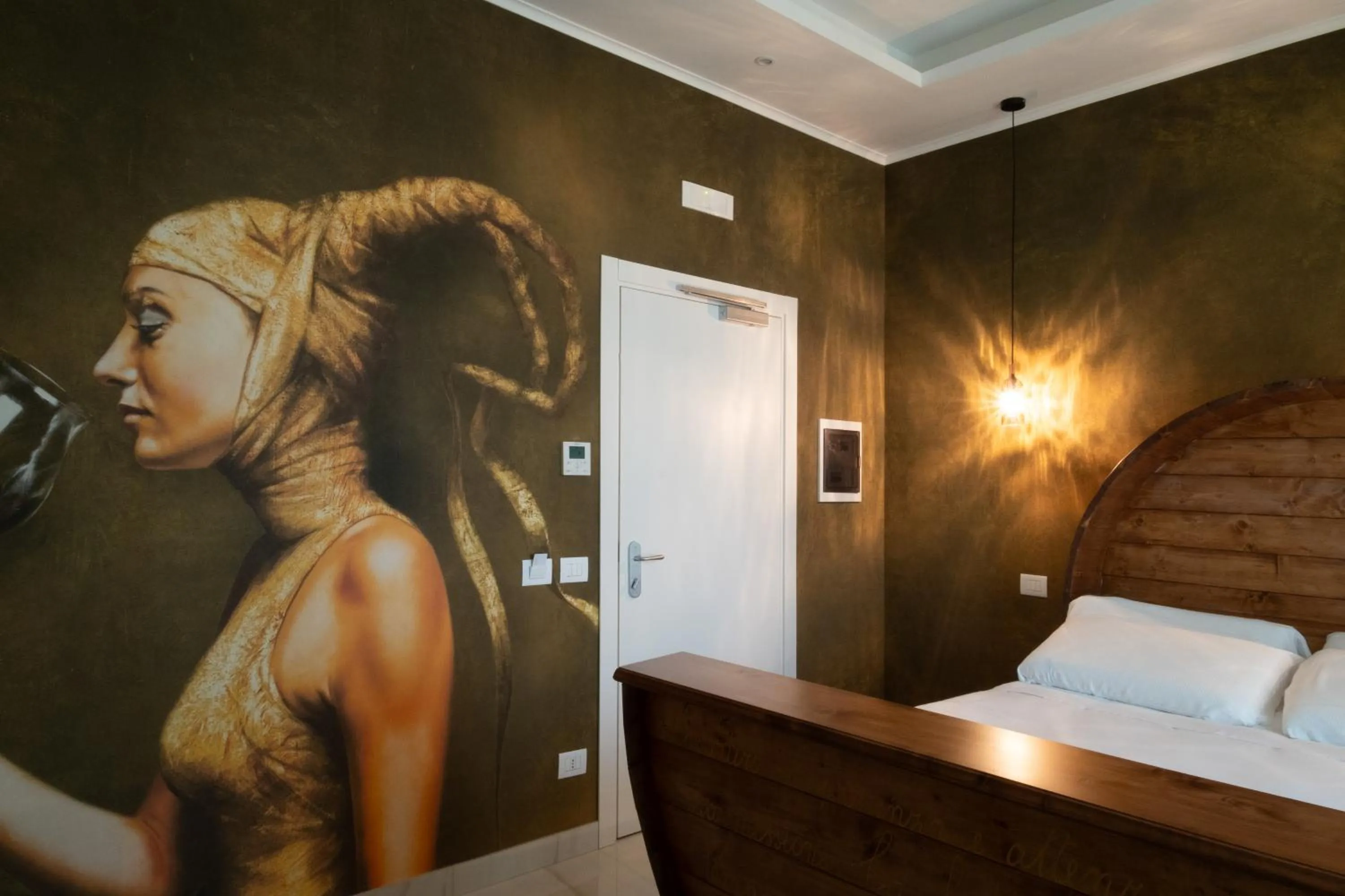 Bed in Palazzo Adele Rooms & Apartments