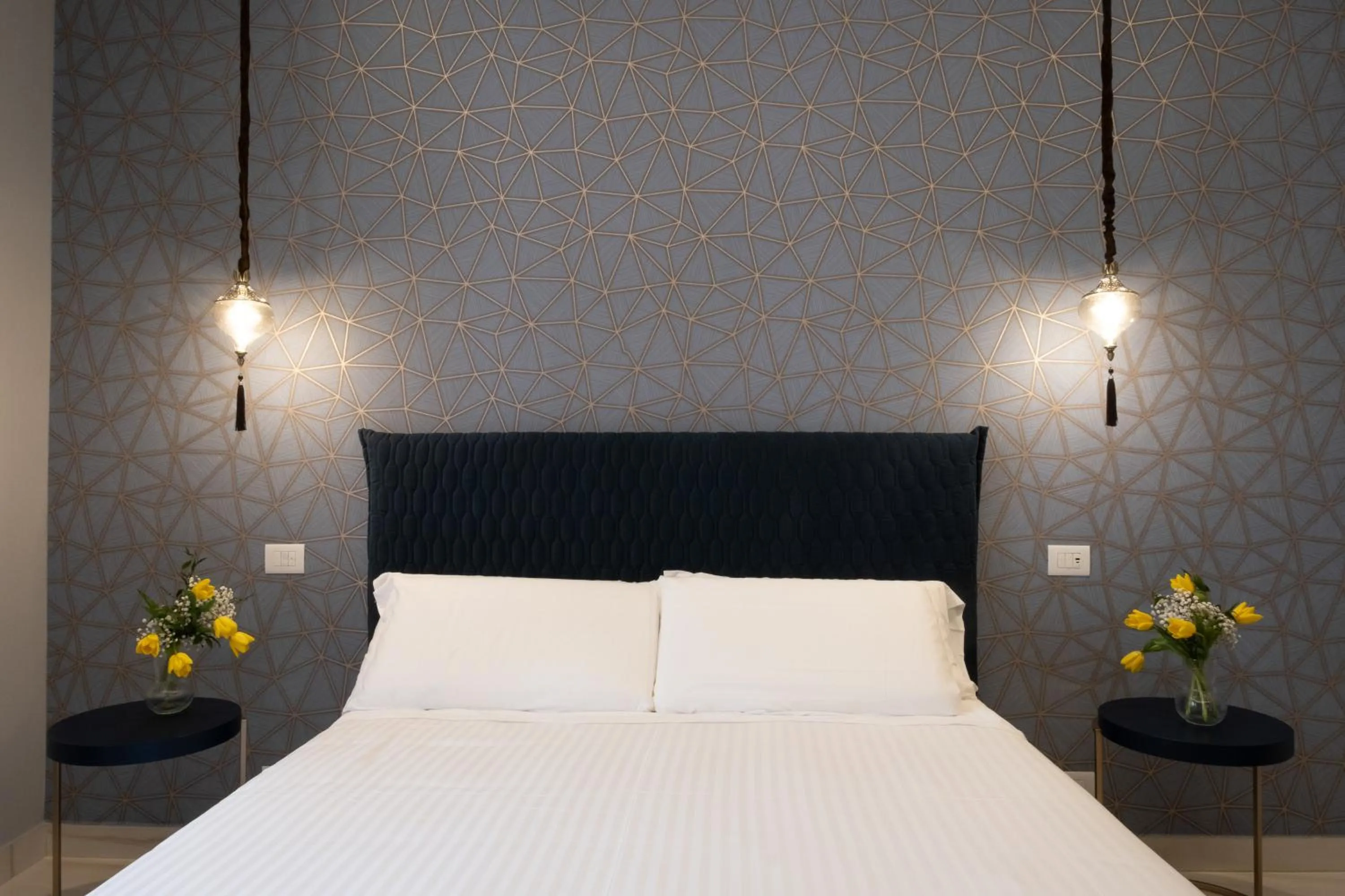 Bed in Palazzo Adele Rooms & Apartments