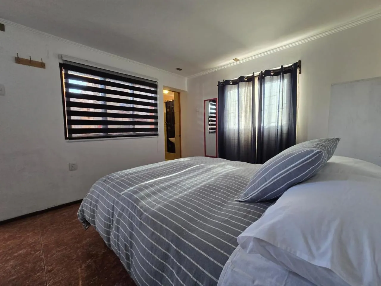 Photo of the whole room, Bed in Hostal Siete Colores