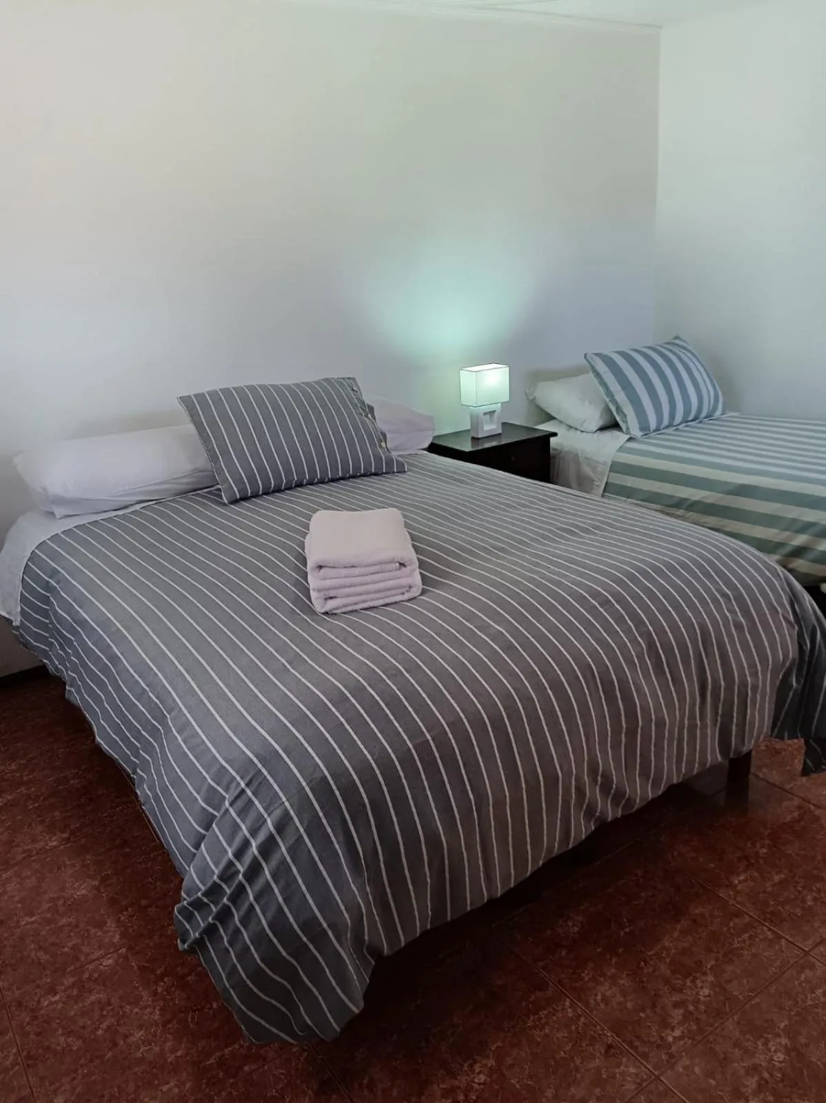 Property building, Bed in Hostal Siete Colores