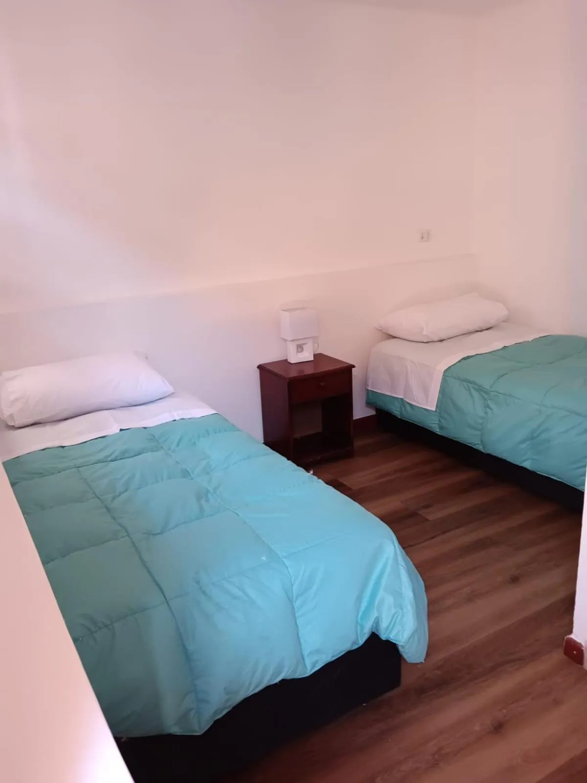 Property building, Bed in Hostal Siete Colores