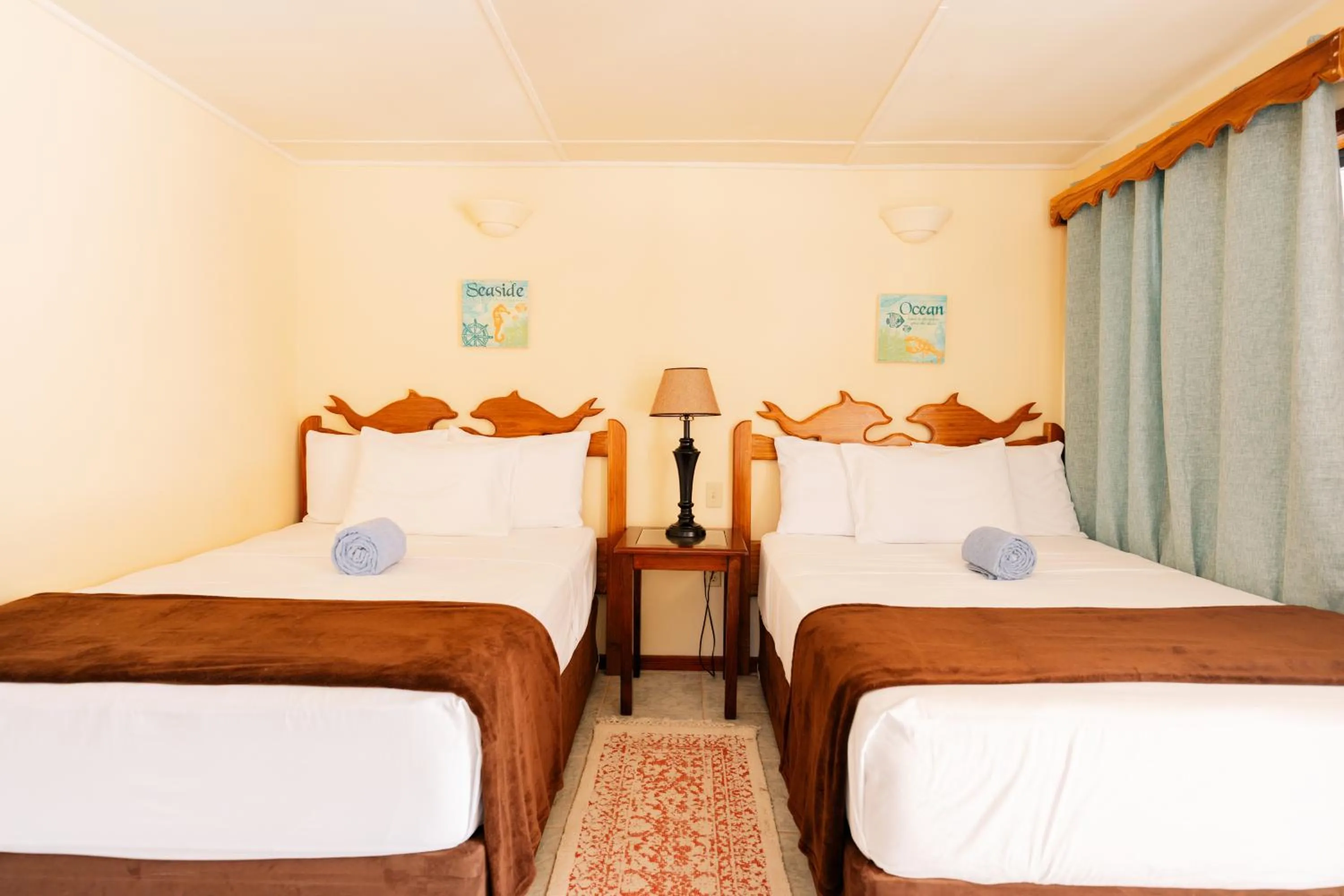towels, Bed in Blue Marlin Beach Resort