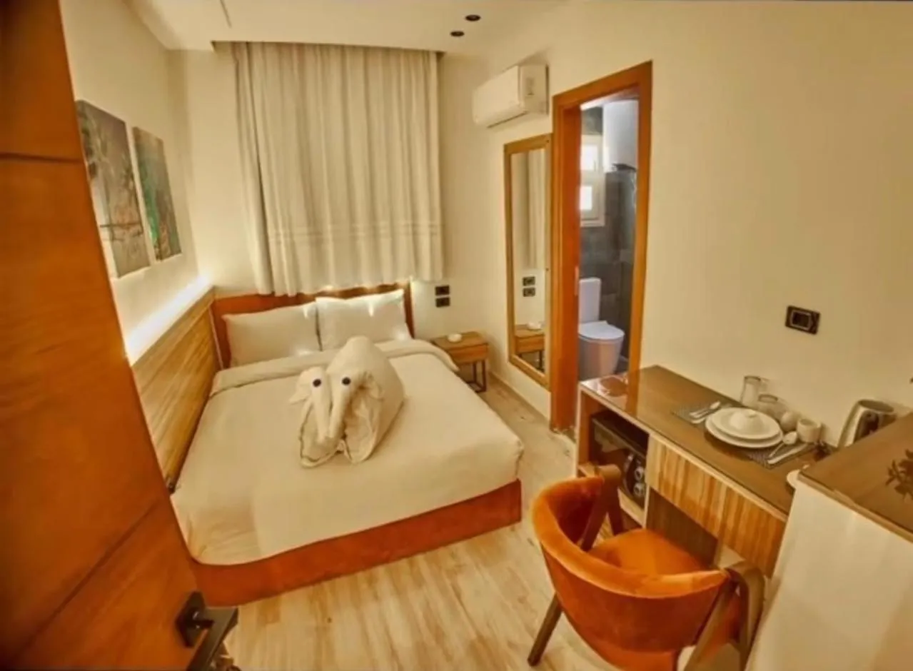 Bed in Elite Boutique Hotel