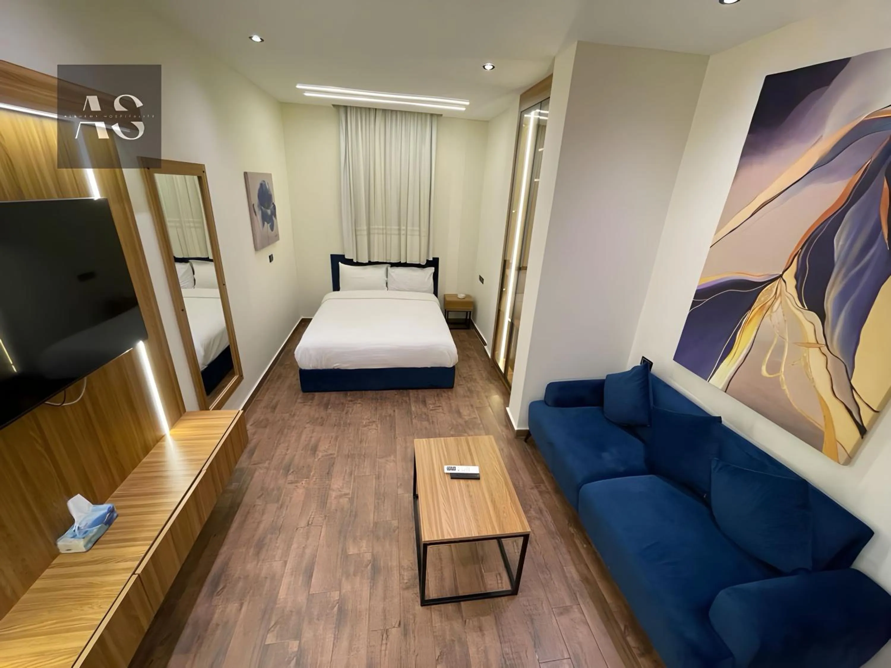 Seating area, Bed in Elite Boutique Hotel