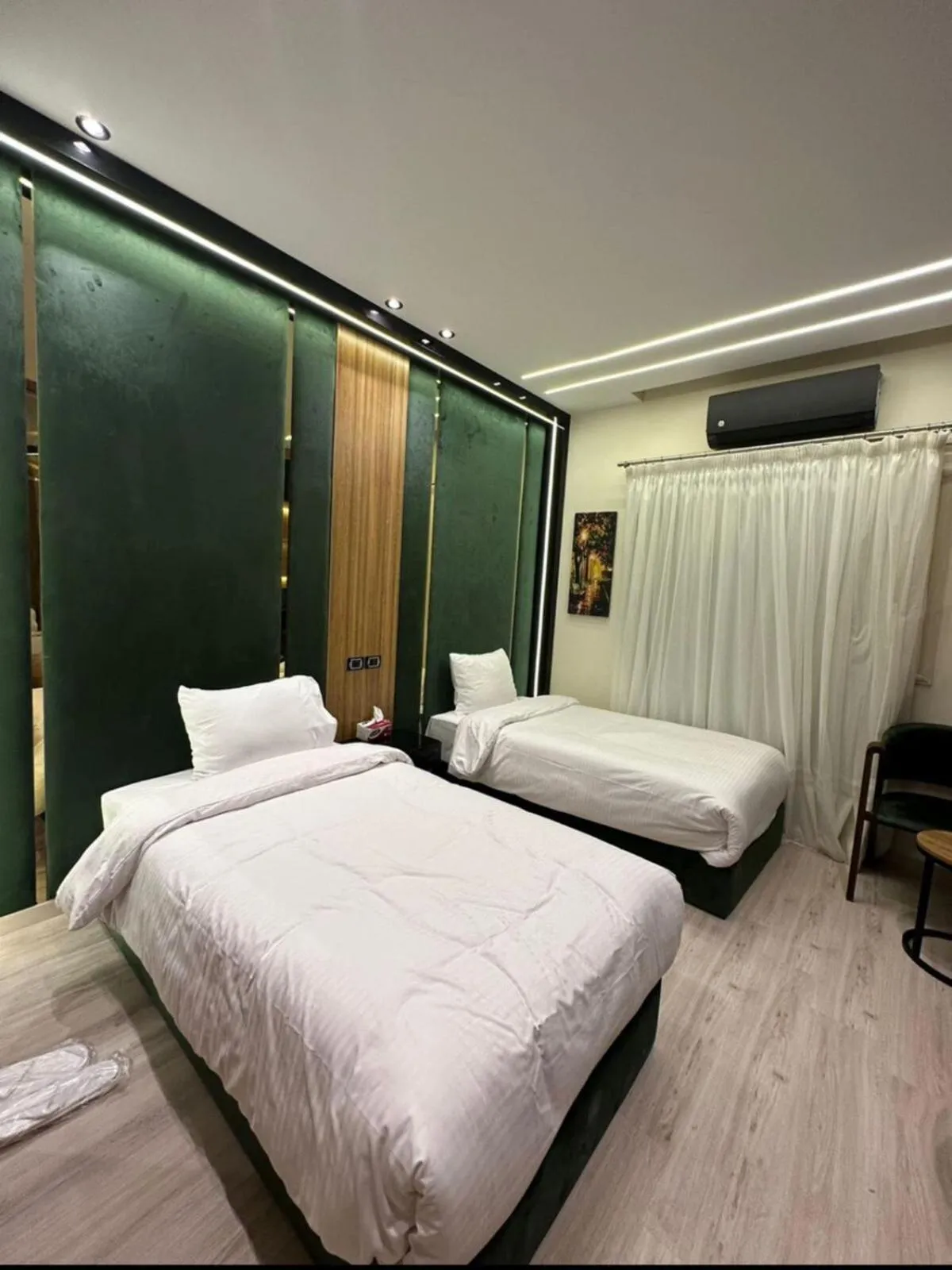 Bed in Elite Boutique Hotel