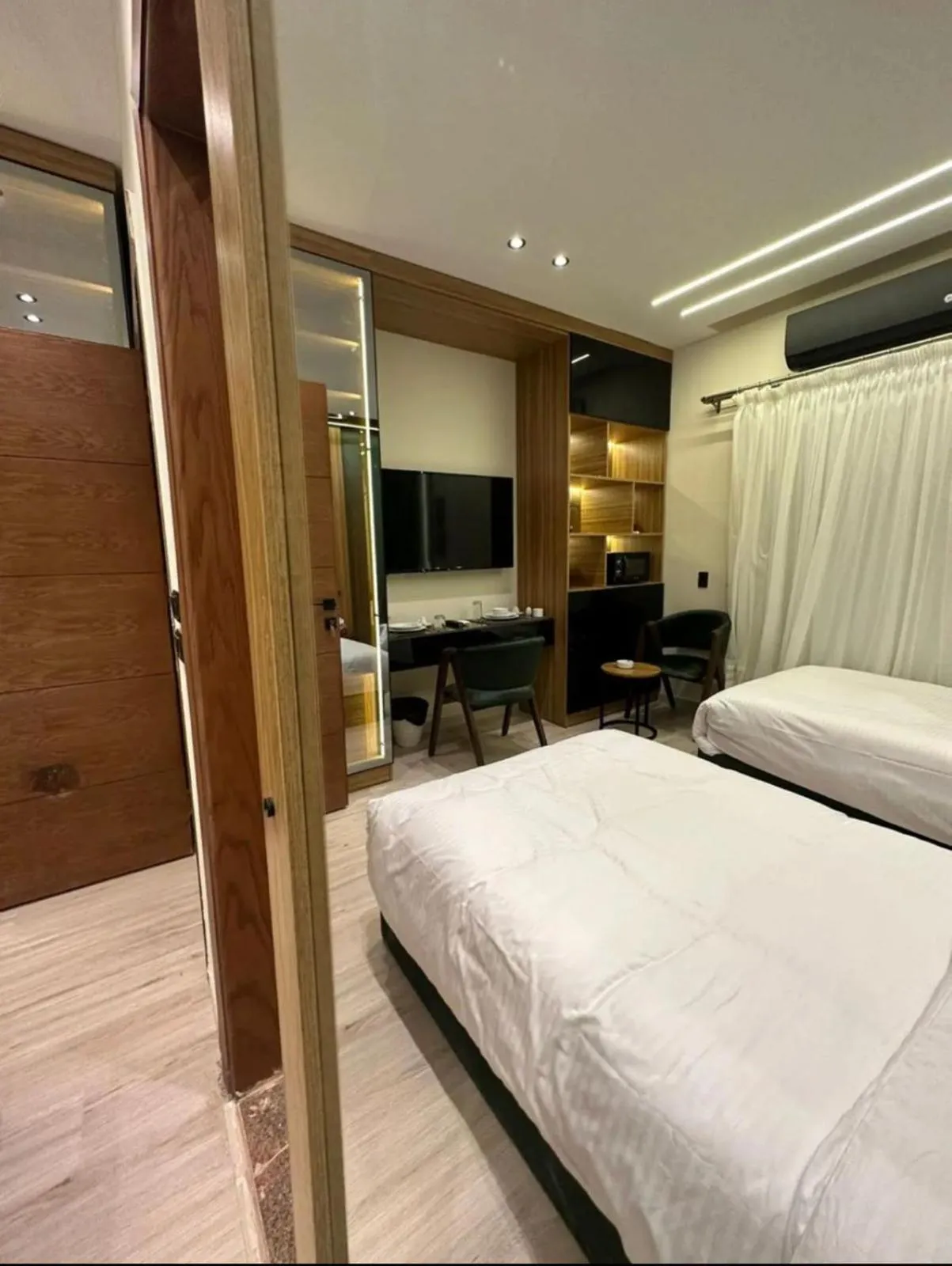 Bed in Elite Boutique Hotel